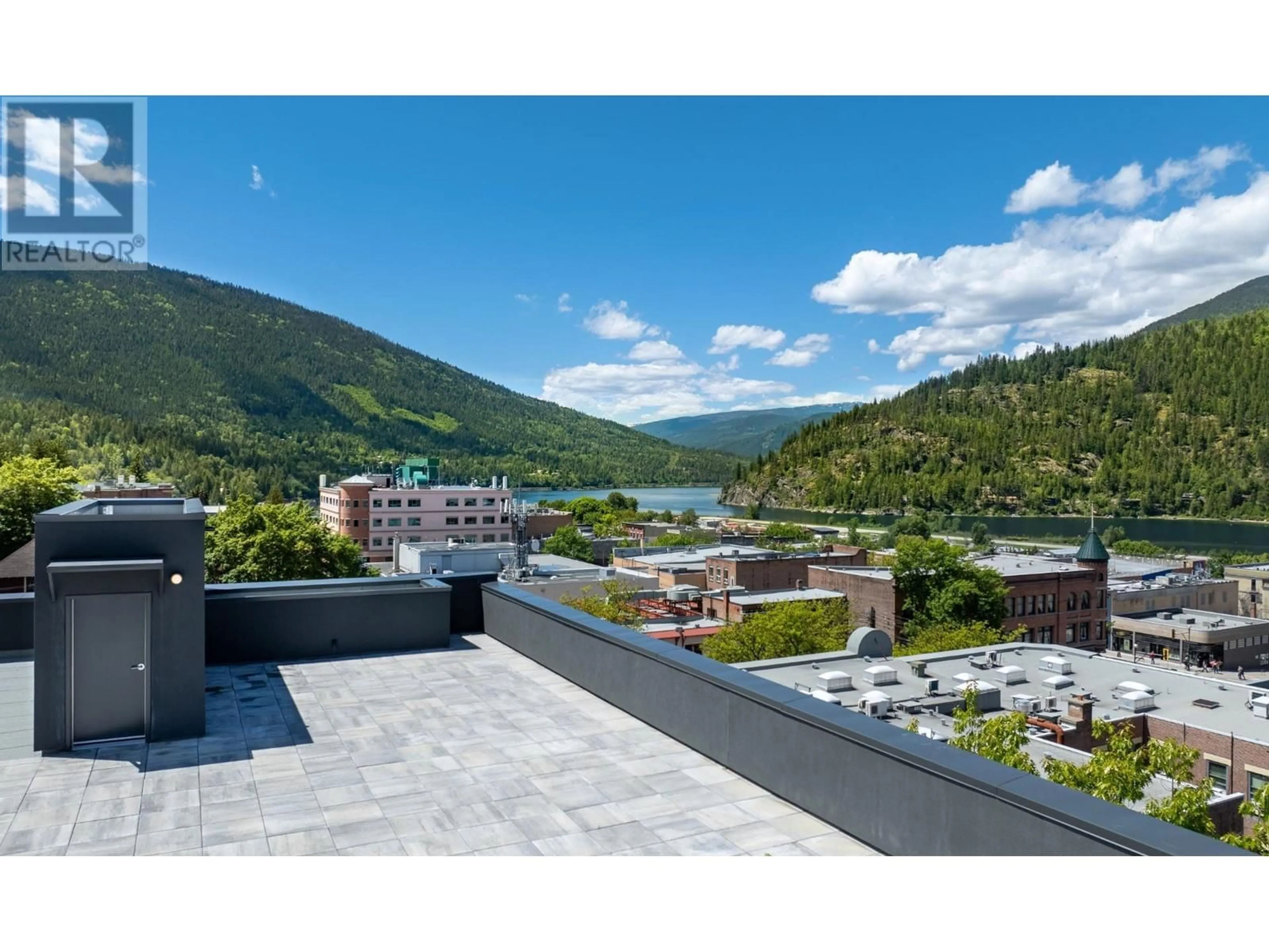 A pic from outside/outdoor area/front of a property/back of a property/a pic from drone, mountain view for 514 VICTORIA Street Unit# 411, Nelson British Columbia V1L4K8