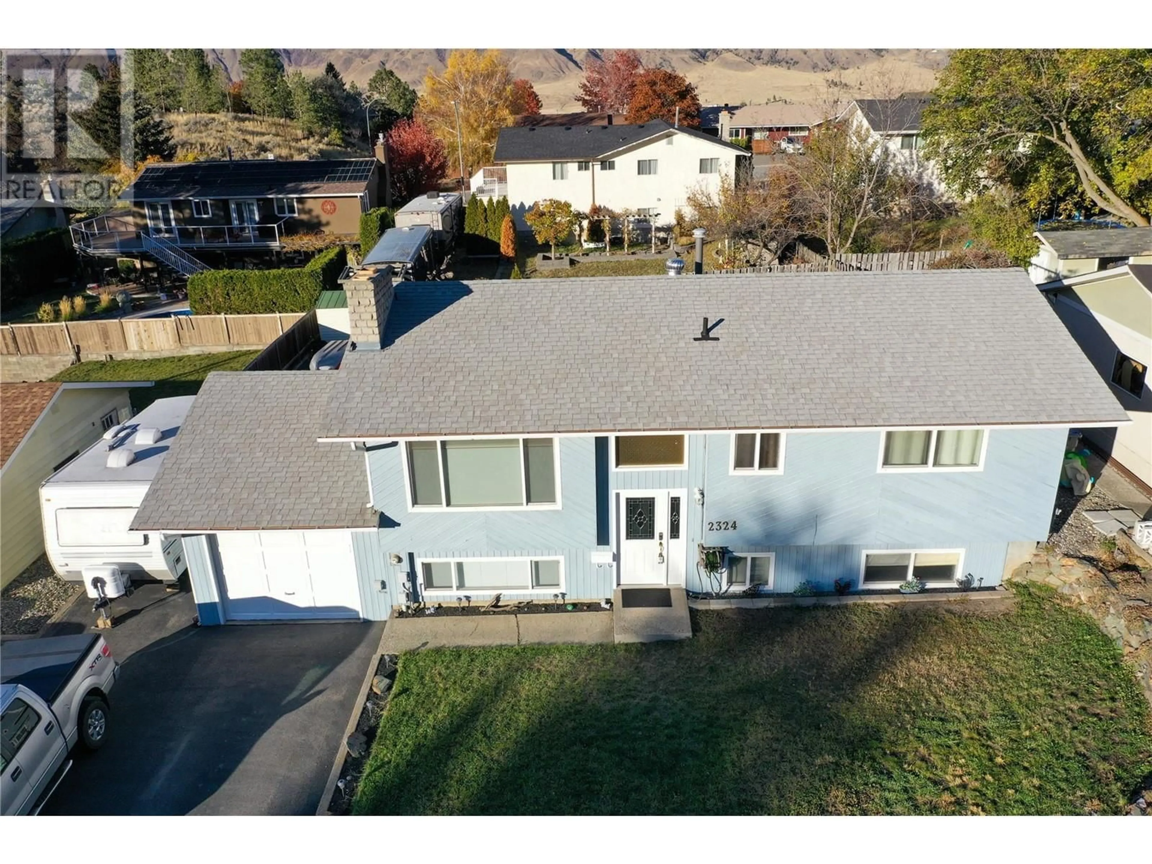 A pic from outside/outdoor area/front of a property/back of a property/a pic from drone, street for 2324 Nechako Drive, Kamloops British Columbia V2E1Z3