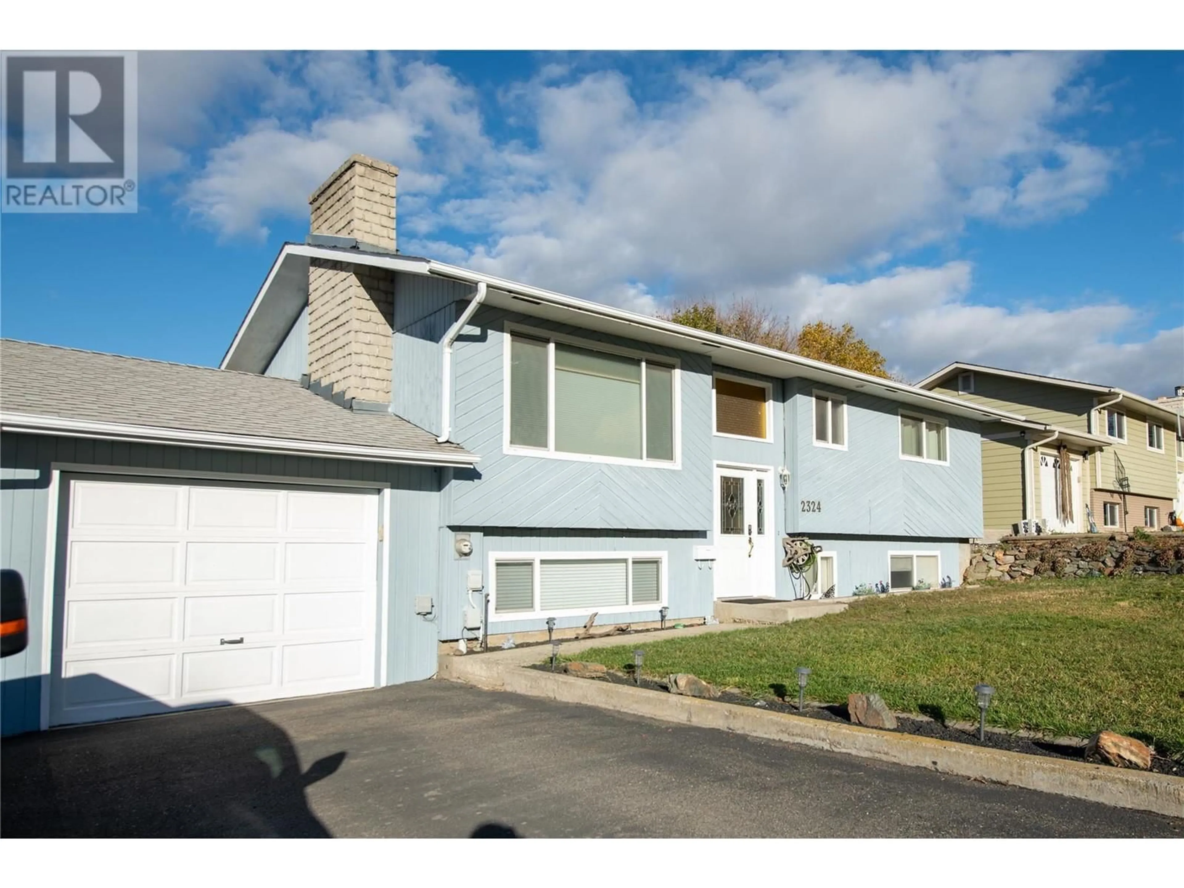 Home with vinyl exterior material, street for 2324 Nechako Drive, Kamloops British Columbia V2E1Z3