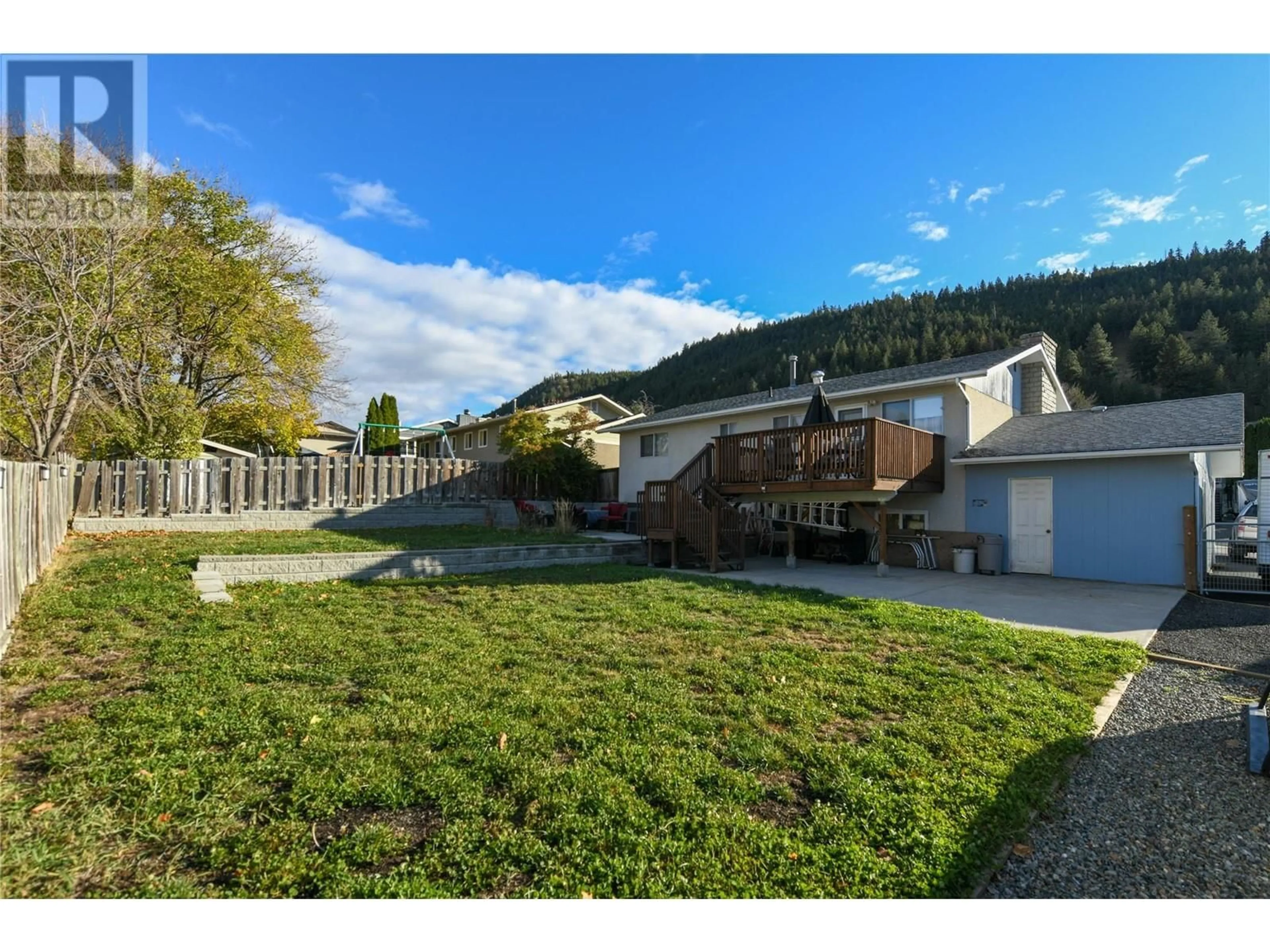 A pic from outside/outdoor area/front of a property/back of a property/a pic from drone, mountain view for 2324 Nechako Drive, Kamloops British Columbia V2E1Z3