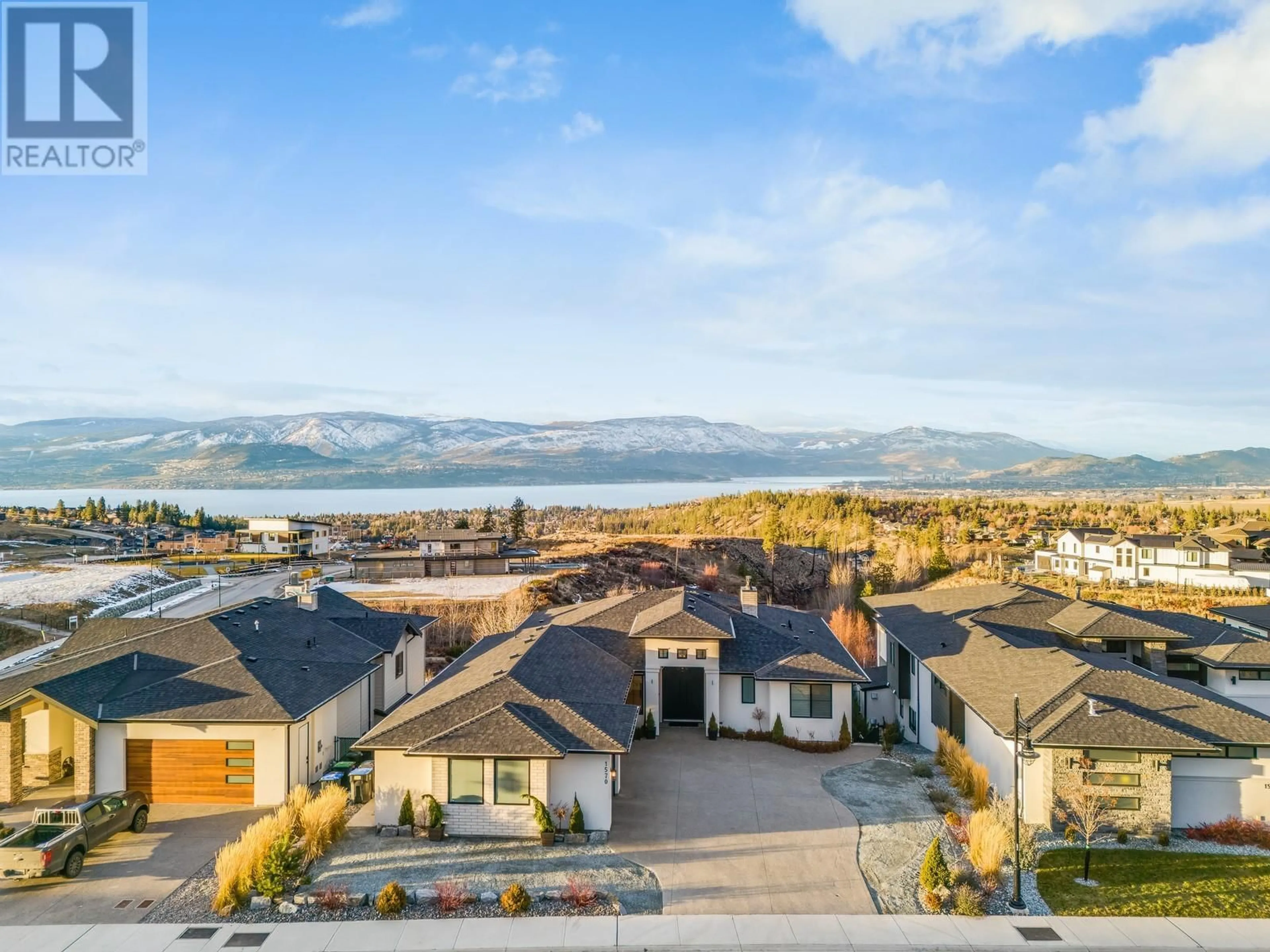 A pic from outside/outdoor area/front of a property/back of a property/a pic from drone, mountain view for 1570 Antler Court, Kelowna British Columbia V1W5N9