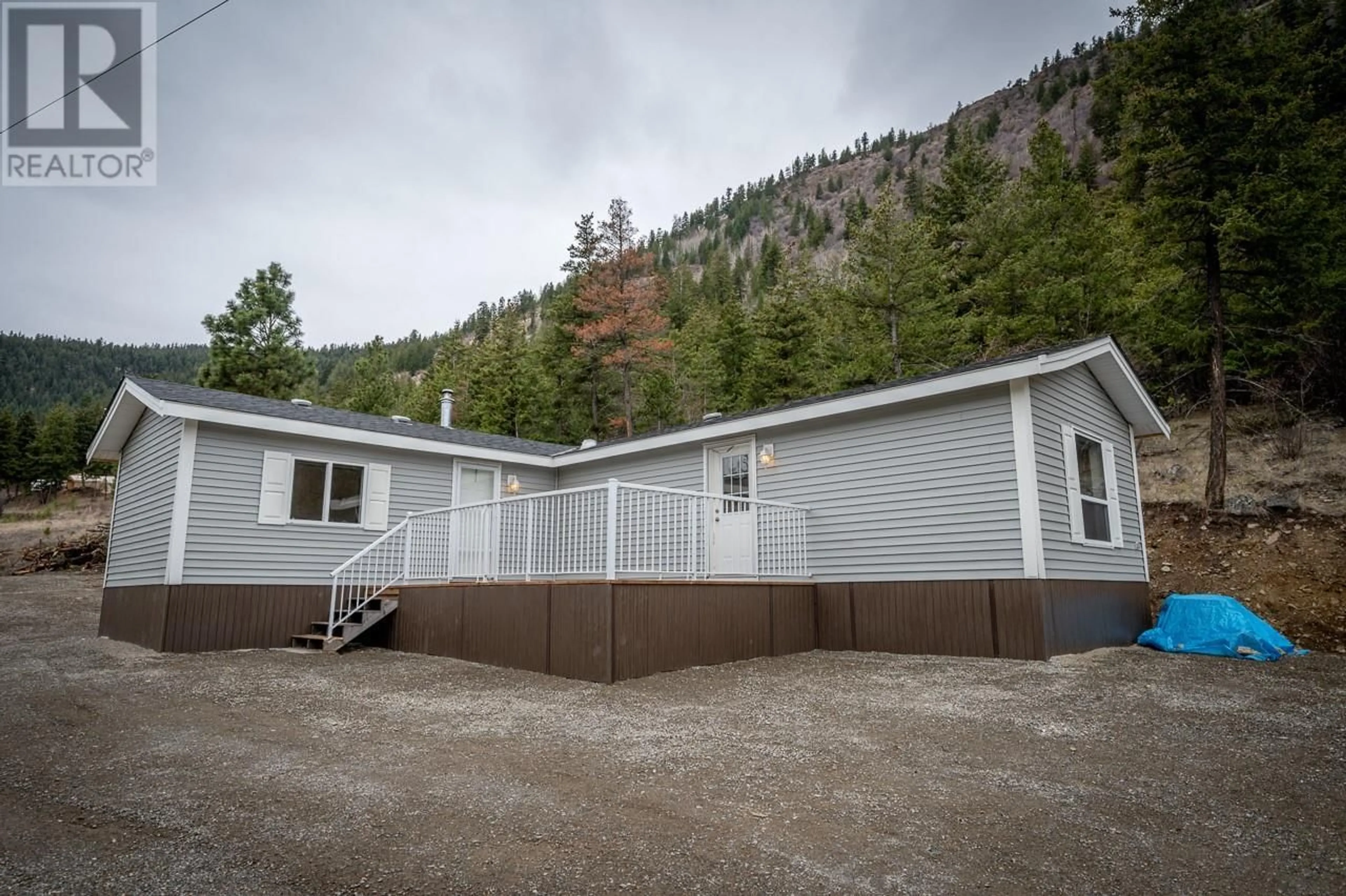 Home with vinyl exterior material, mountain view for 1675 LADNER Road, Kamloops British Columbia V2C5J4