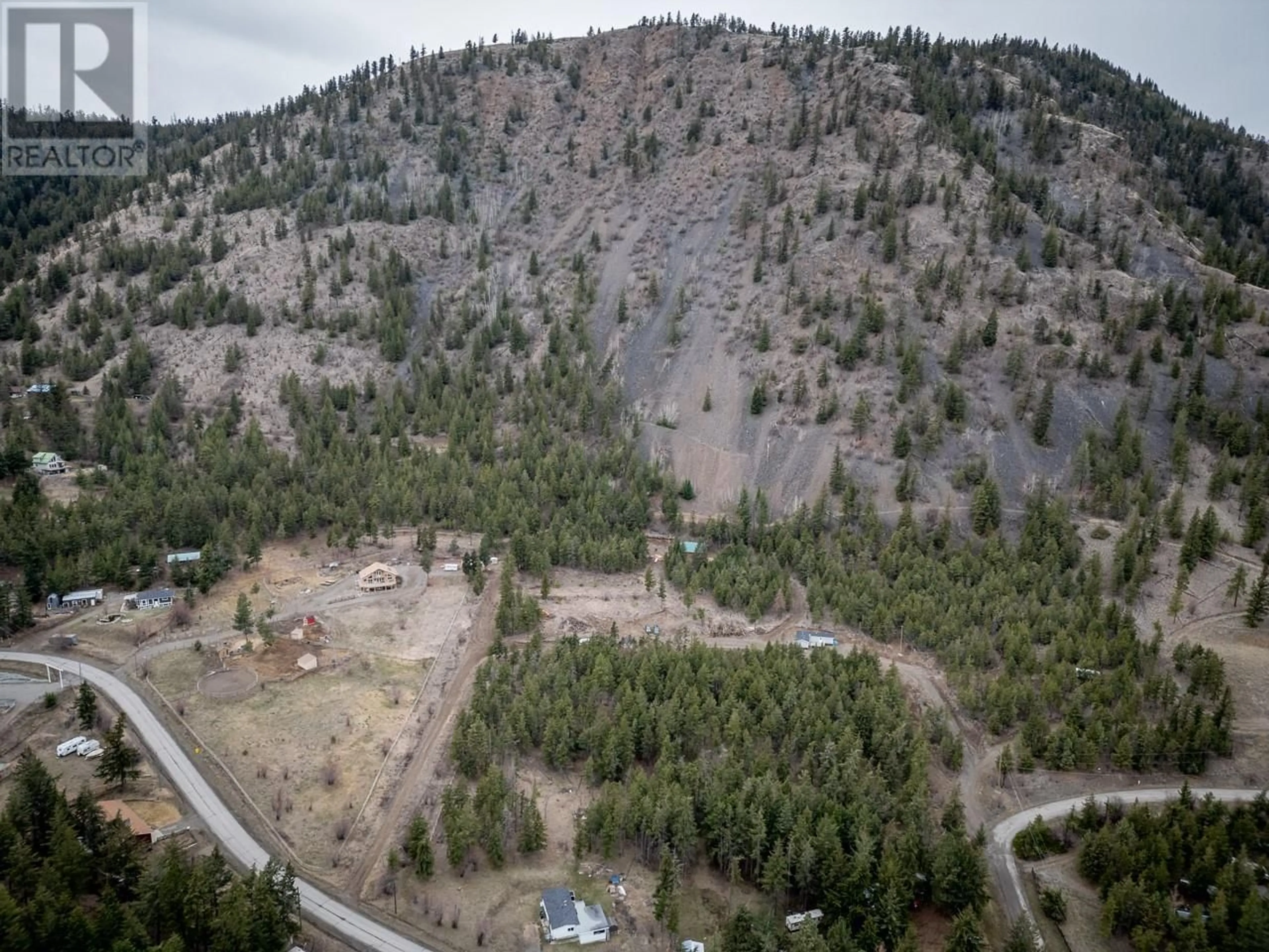 A pic from outside/outdoor area/front of a property/back of a property/a pic from drone, forest/trees view for 1675 LADNER Road, Kamloops British Columbia V2C5J4