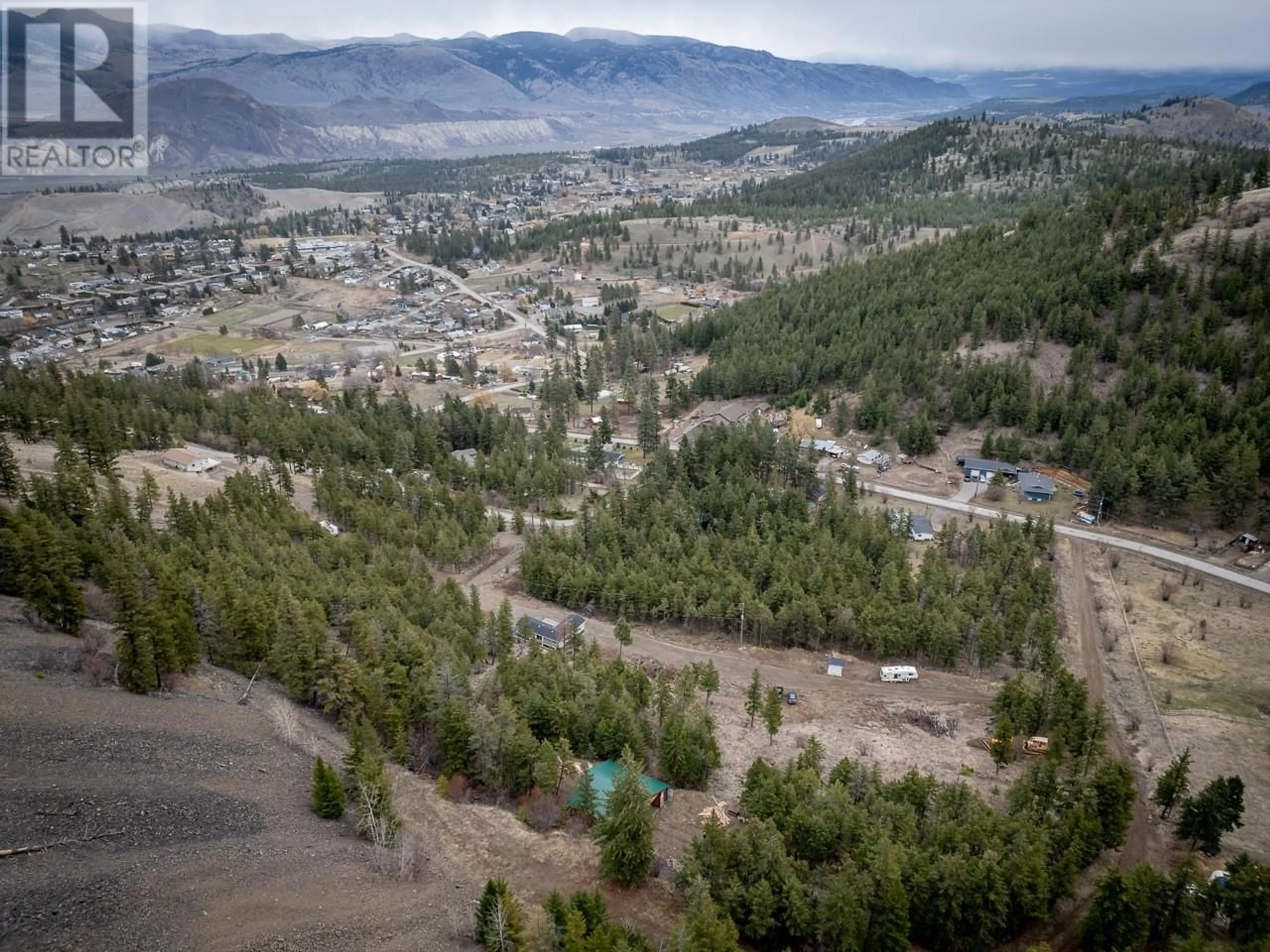 A pic from outside/outdoor area/front of a property/back of a property/a pic from drone, mountain view for 1675 LADNER Road, Kamloops British Columbia V2C5J4