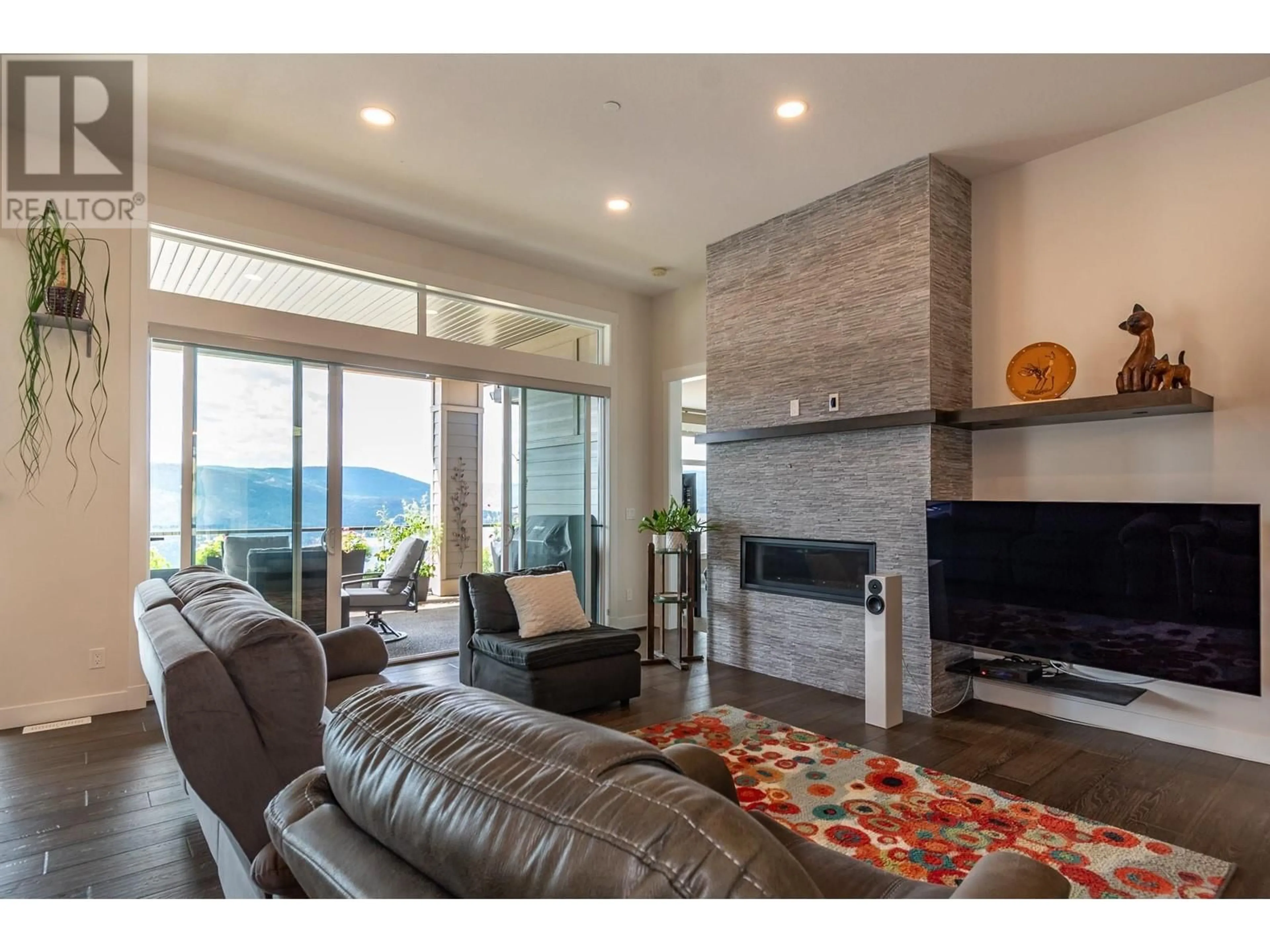 Living room with furniture, unknown for 8992 Tavistock Road, Vernon British Columbia V1H2L4