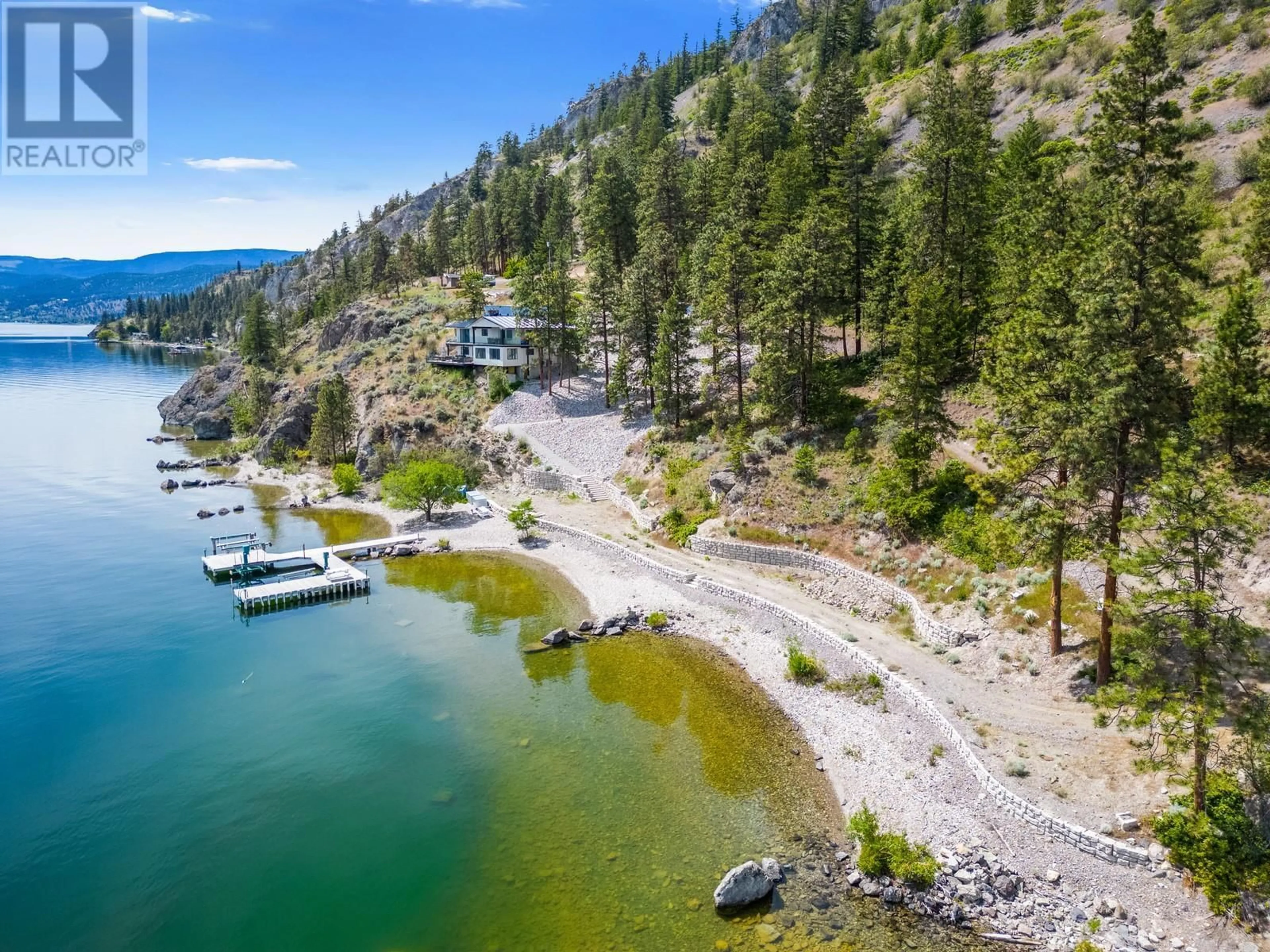 A pic from outside/outdoor area/front of a property/back of a property/a pic from drone, water/lake/river/ocean view for 2888 Seclusion Bay Road, West Kelowna British Columbia V4T1W5