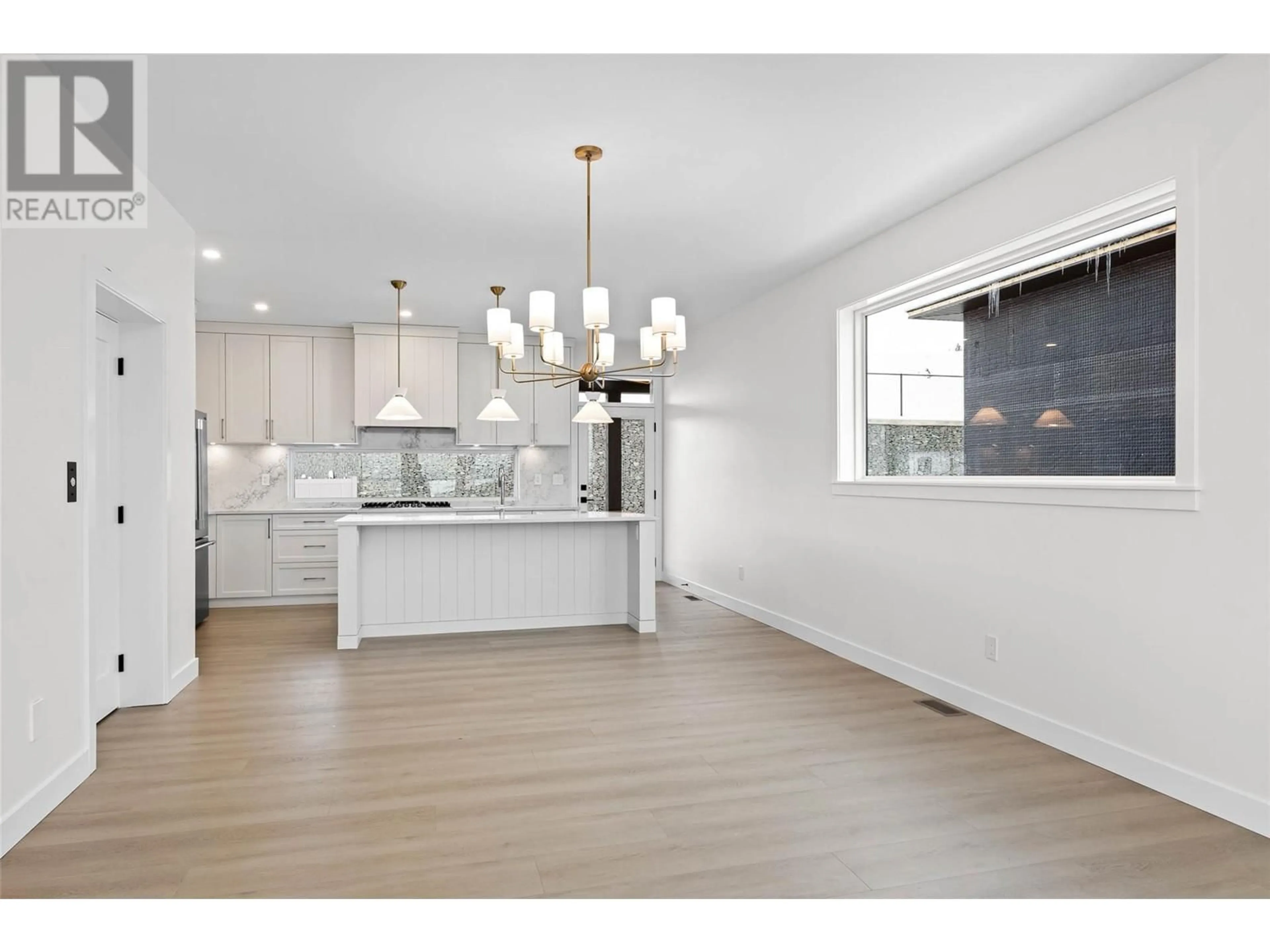 Open concept kitchen, wood/laminate floor for 1294 BRECHIN PLACE, Kamloops British Columbia V1S0G3