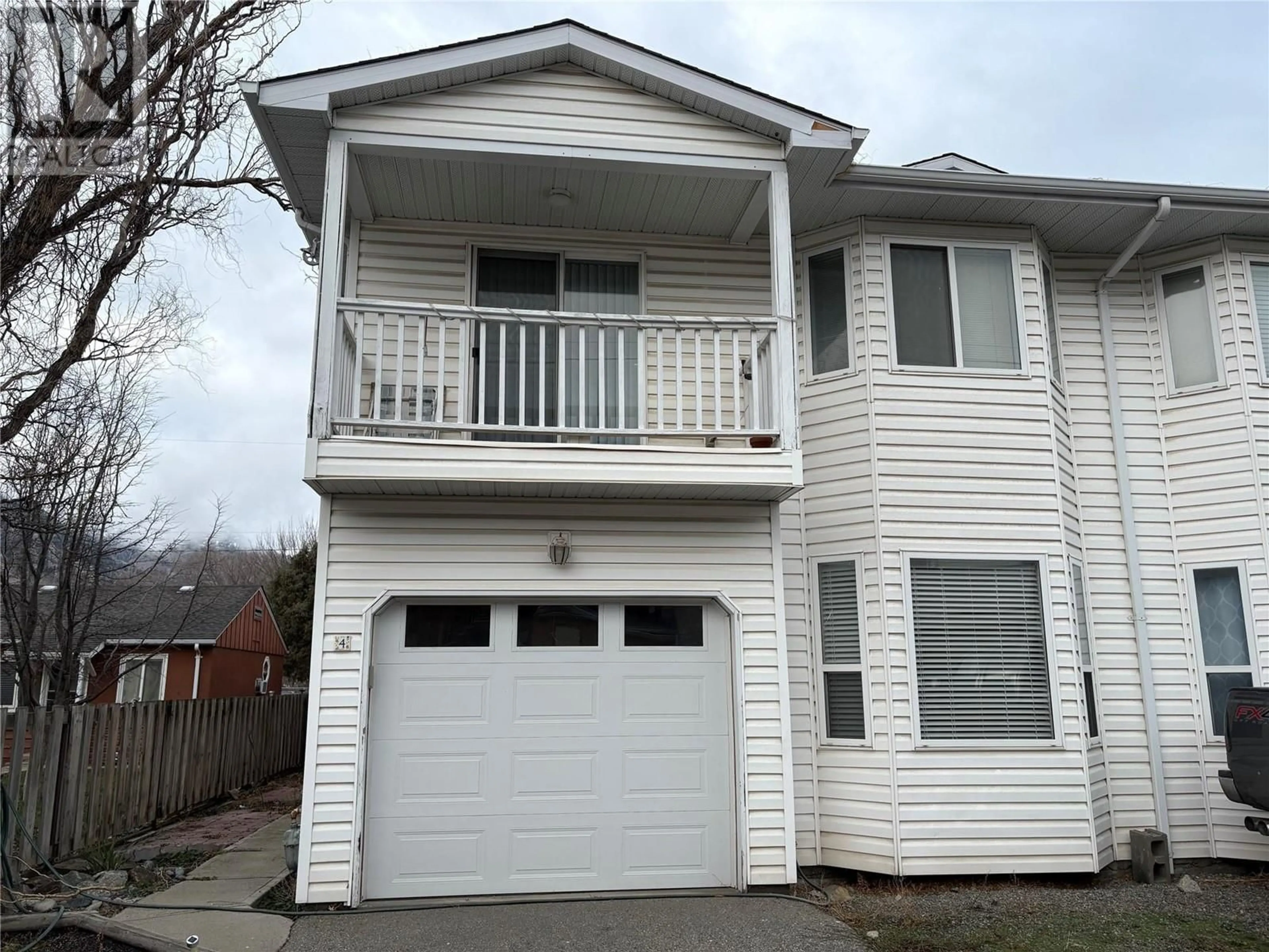 Home with vinyl exterior material, street for 615 6th Avenue Unit# 4, Keremeos British Columbia V0X1N0