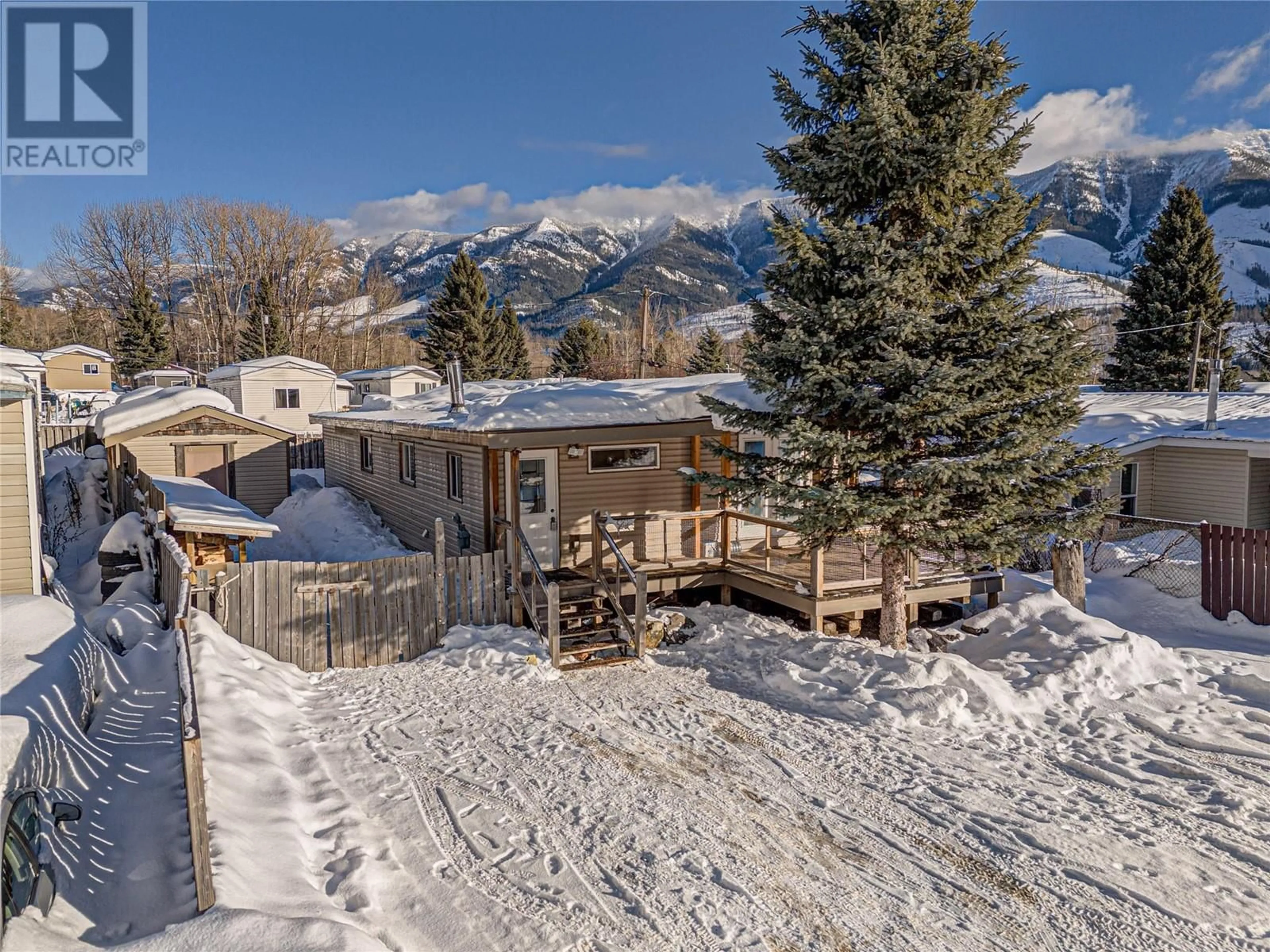 A pic from outside/outdoor area/front of a property/back of a property/a pic from drone, mountain view for 1333 Dicken Road Unit# C29, Fernie British Columbia V0B1M5