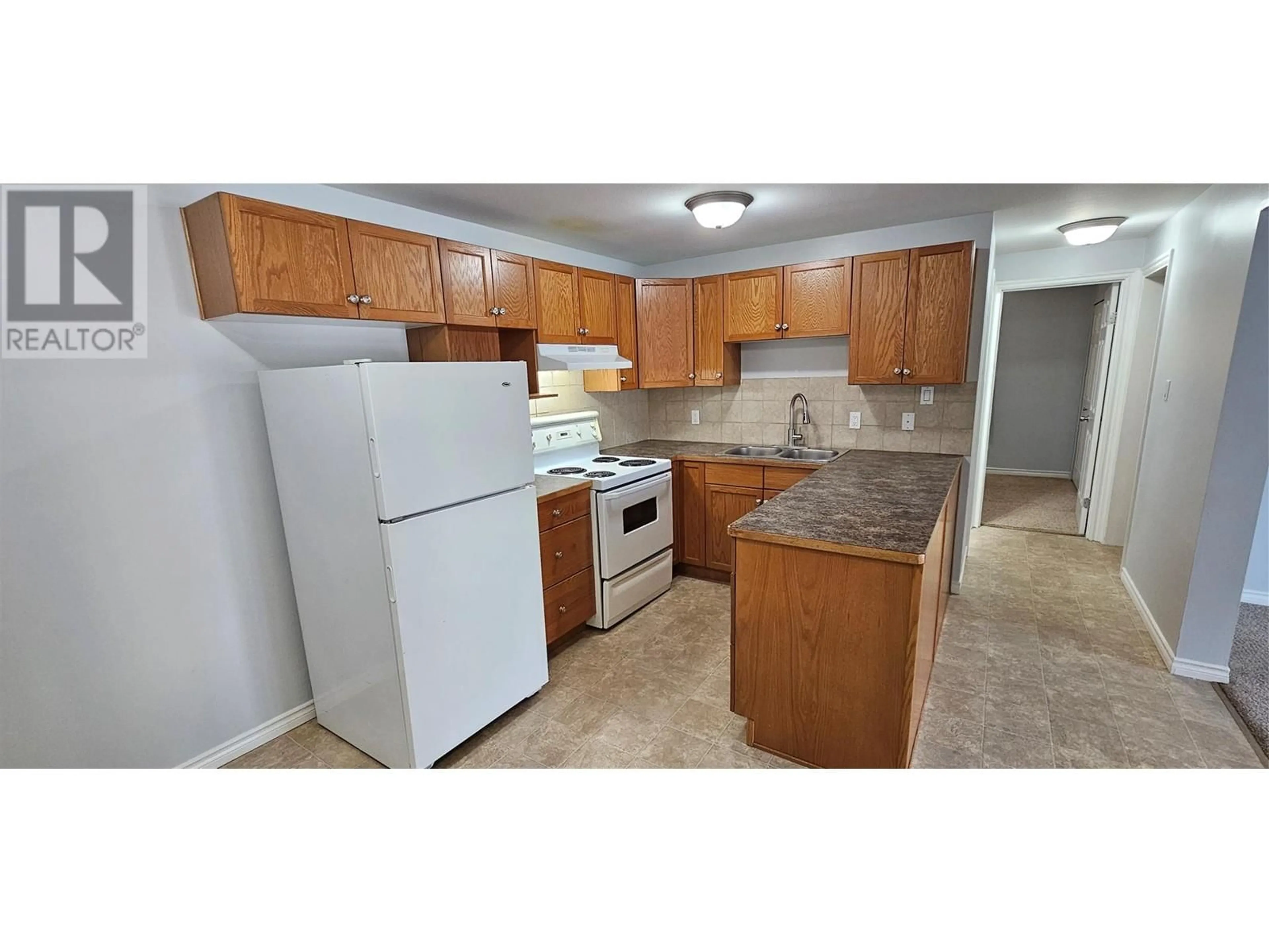 Standard kitchen, unknown for 152 Spruce Avenue Unit# 101, Sparwood British Columbia V0B2G0