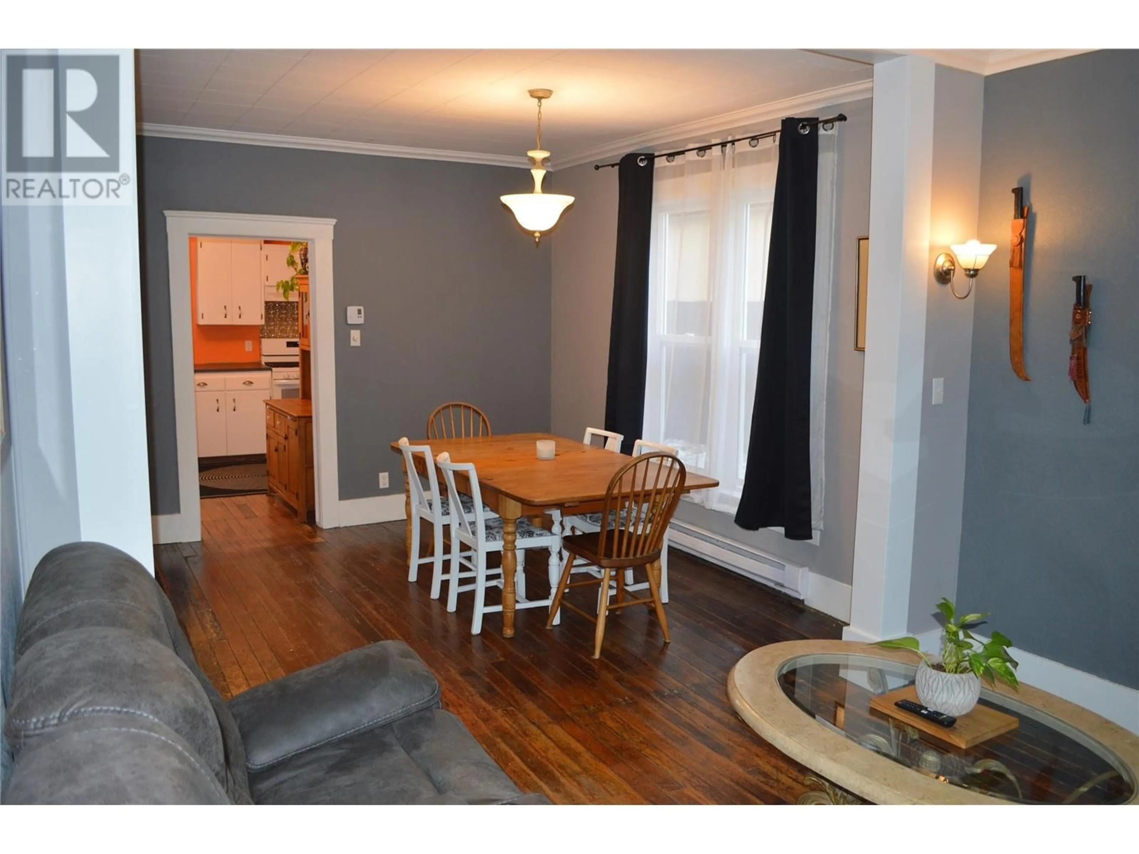 Dining room, wood/laminate floor for 7577 4th Street, Grand Forks British Columbia V0H1H0