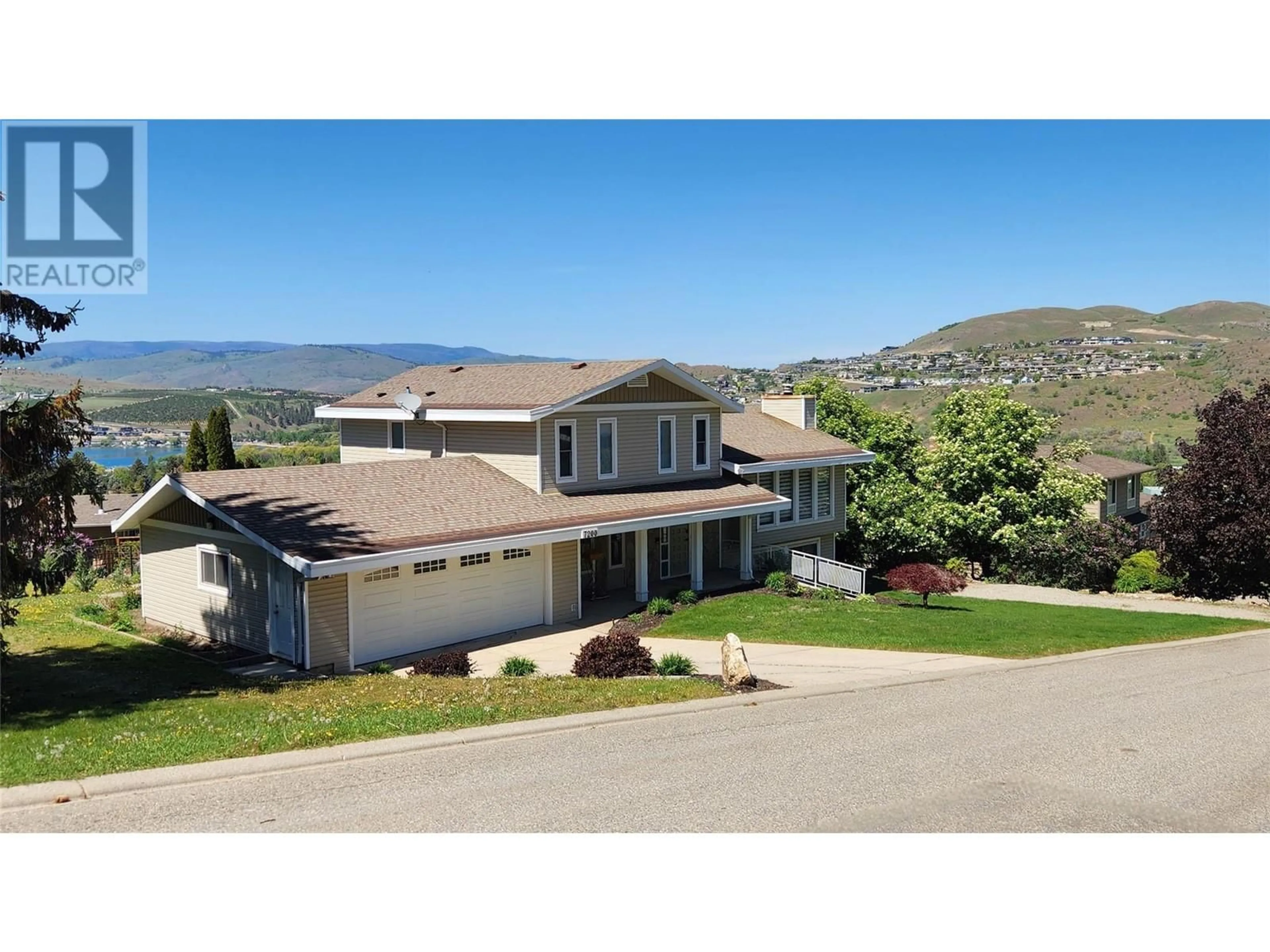 A pic from outside/outdoor area/front of a property/back of a property/a pic from drone, mountain view for 7200 Summit Drive, Coldstream British Columbia V1B2A8