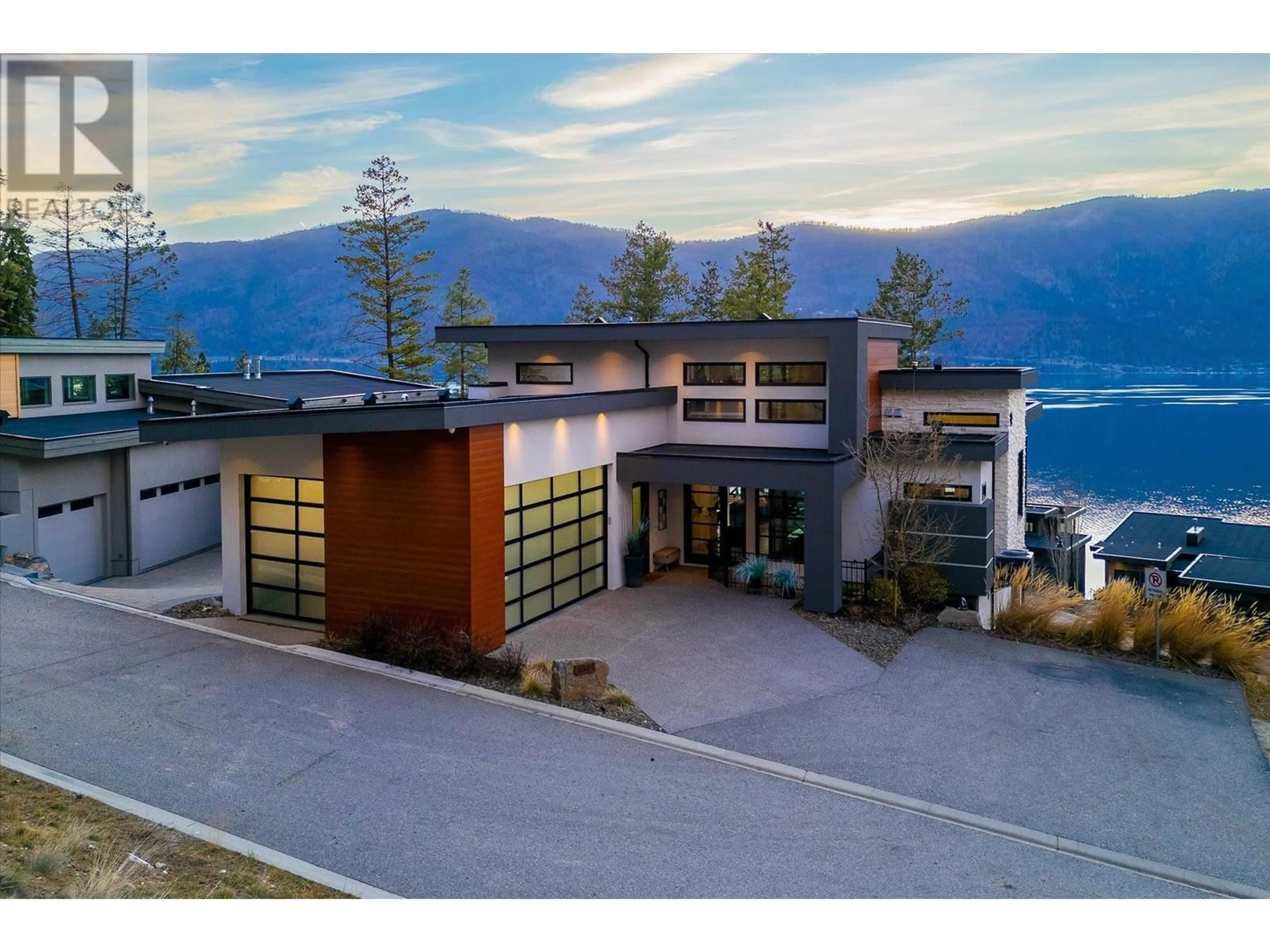 A pic from outside/outdoor area/front of a property/back of a property/a pic from drone, mountain view for 3324 Black Pine Lane, Kelowna British Columbia V1V3G1