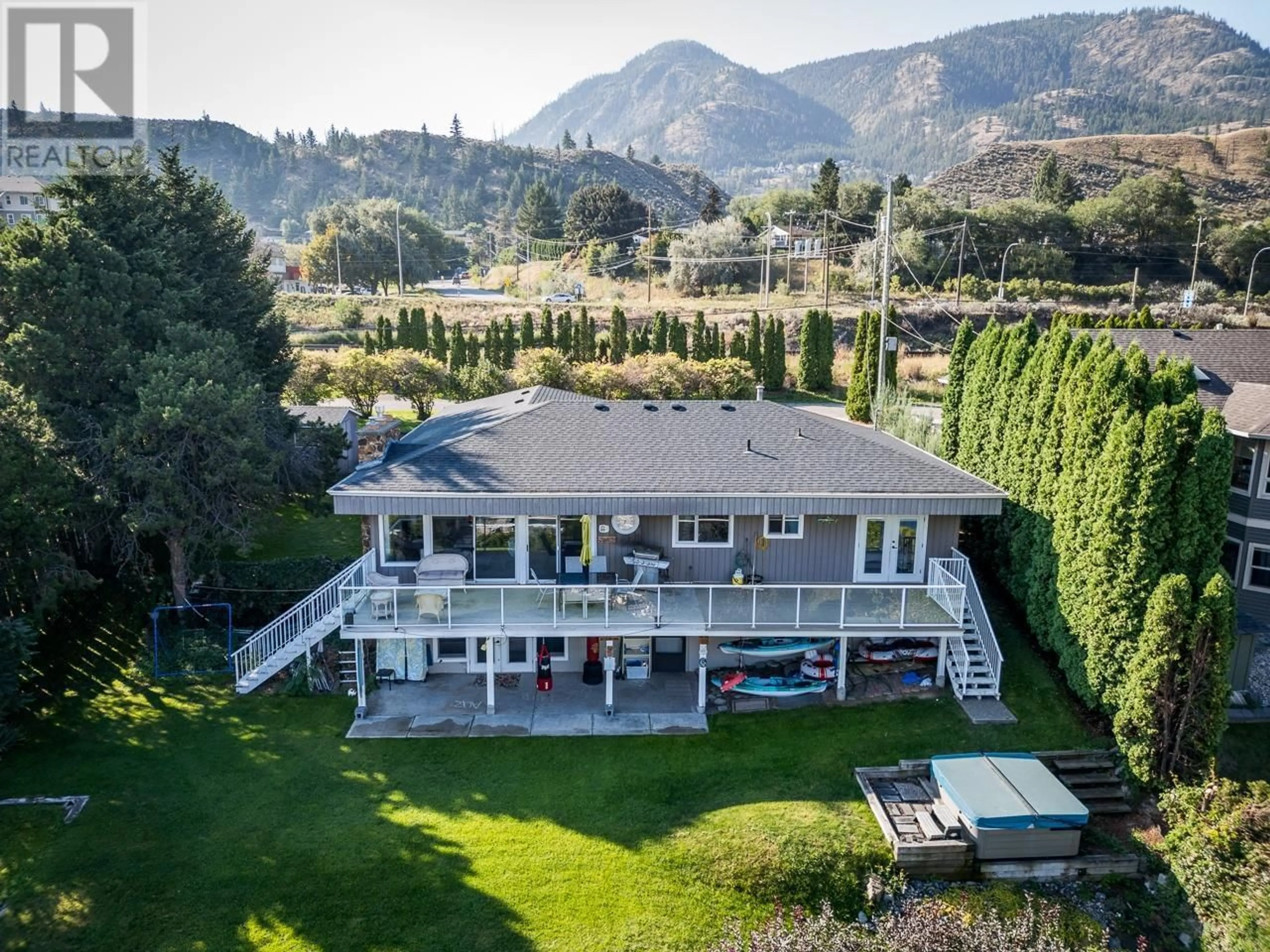 A pic from outside/outdoor area/front of a property/back of a property/a pic from drone, mountain view for 5050 KIPP Road, Kamloops British Columbia V2H1T7