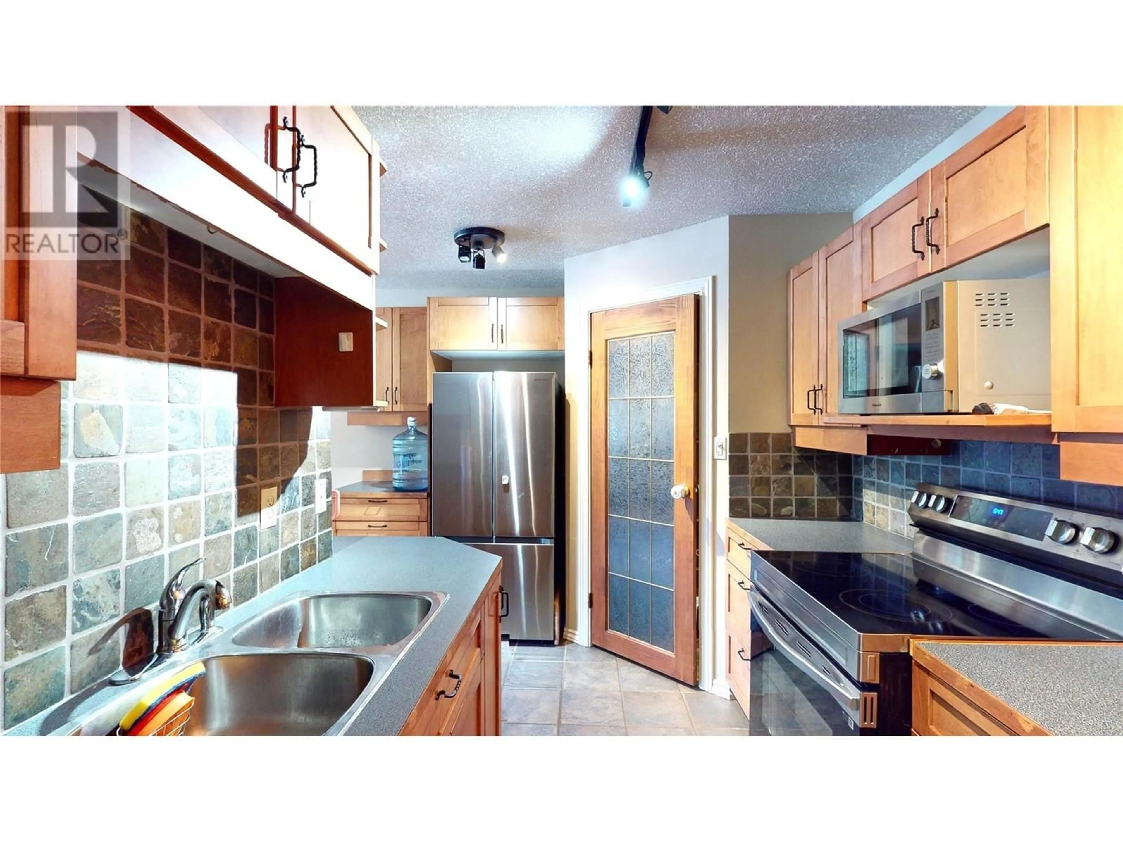 Standard kitchen, ceramic/tile floor for 10 CARIBOO Drive Unit# 315 & 316, Elkford British Columbia V0B1H0