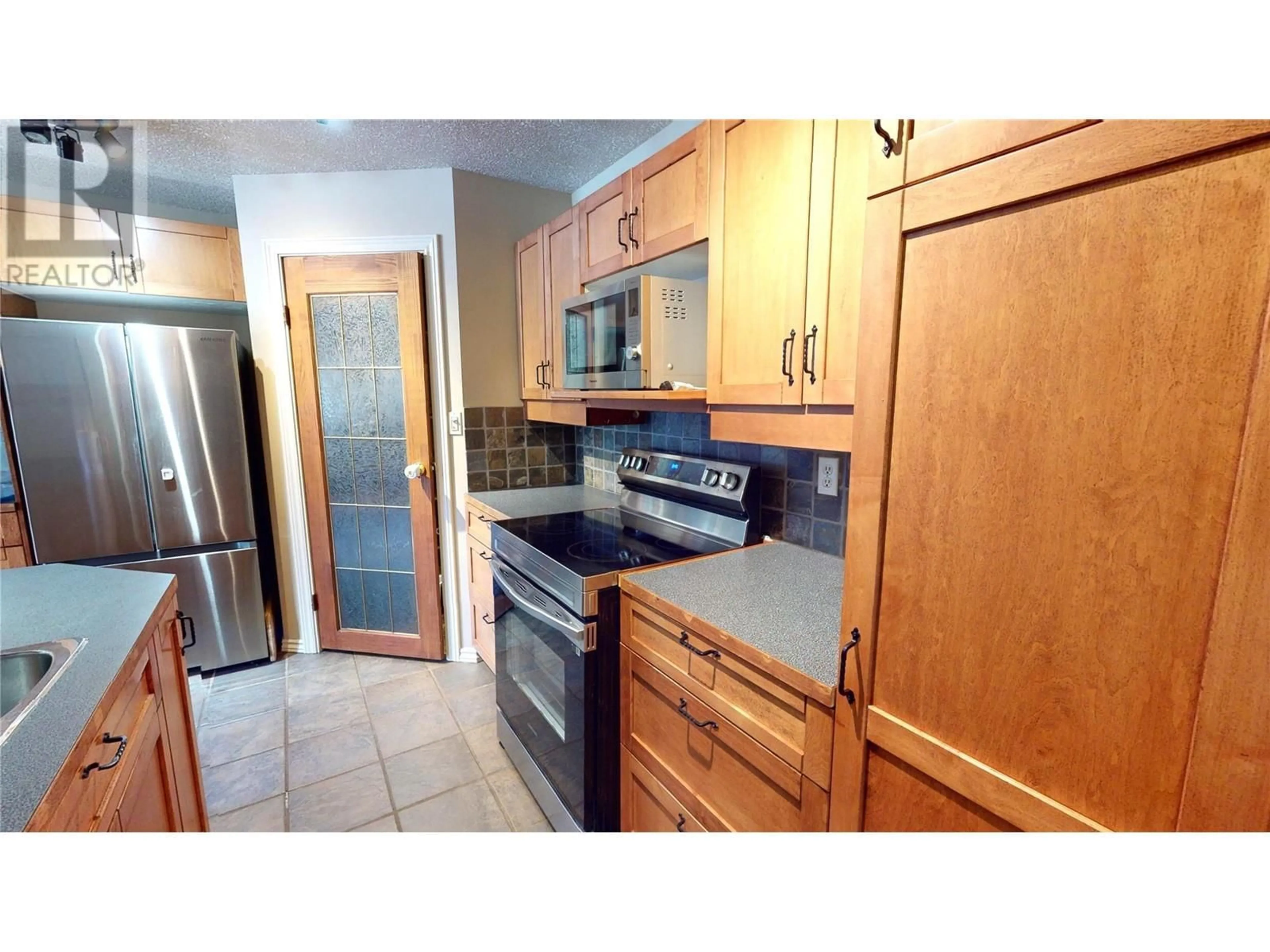 Standard kitchen, ceramic/tile floor for 10 CARIBOO Drive Unit# 315 & 316, Elkford British Columbia V0B1H0