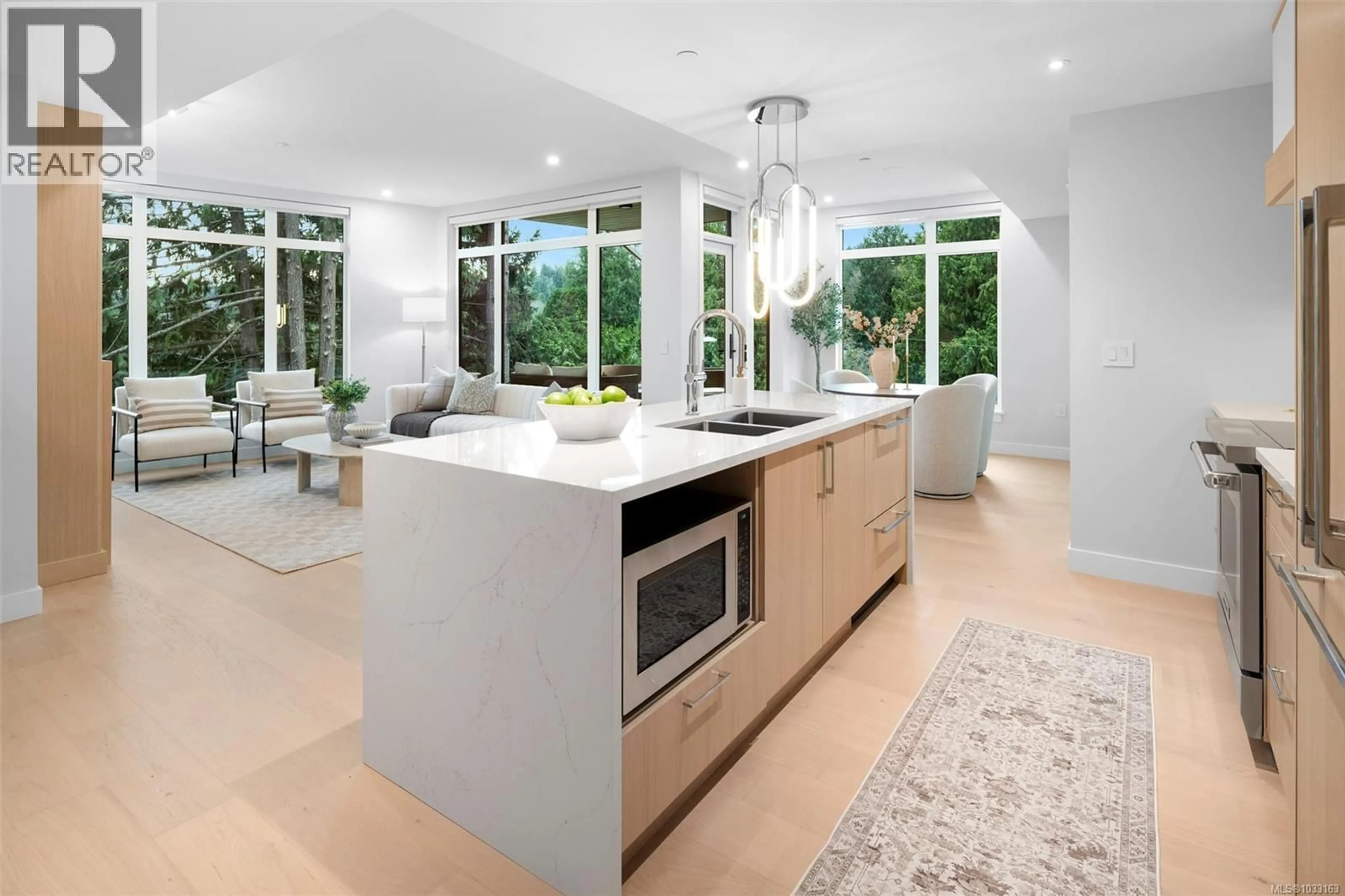 Open concept kitchen, ceramic/tile floor for 203 - 5229 CORDOVA BAY ROAD, Saanich British Columbia V8Y2L1