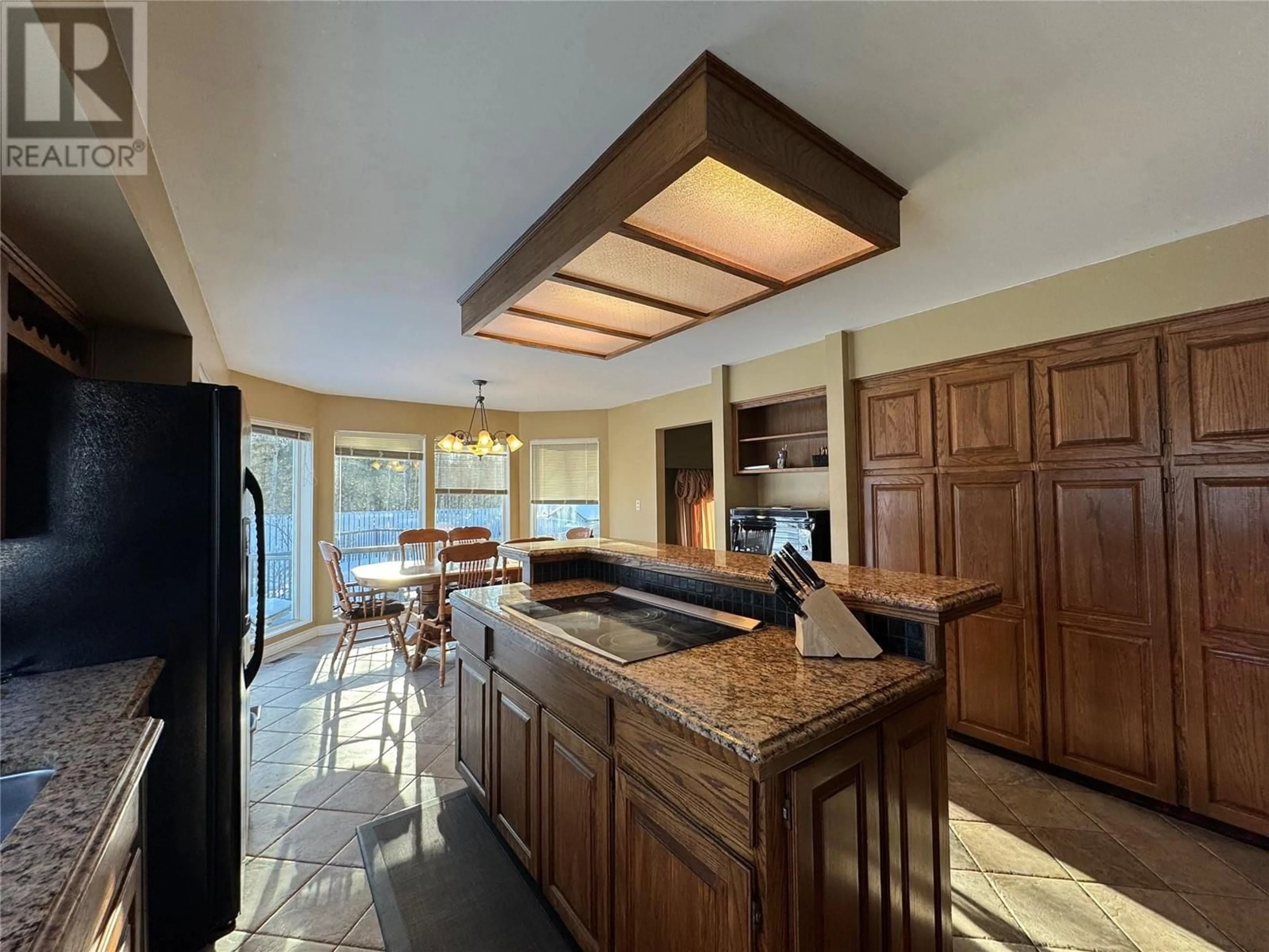 Open concept kitchen, ceramic/tile floor for 12 Collier Place, Tumbler Ridge British Columbia V0C2W0