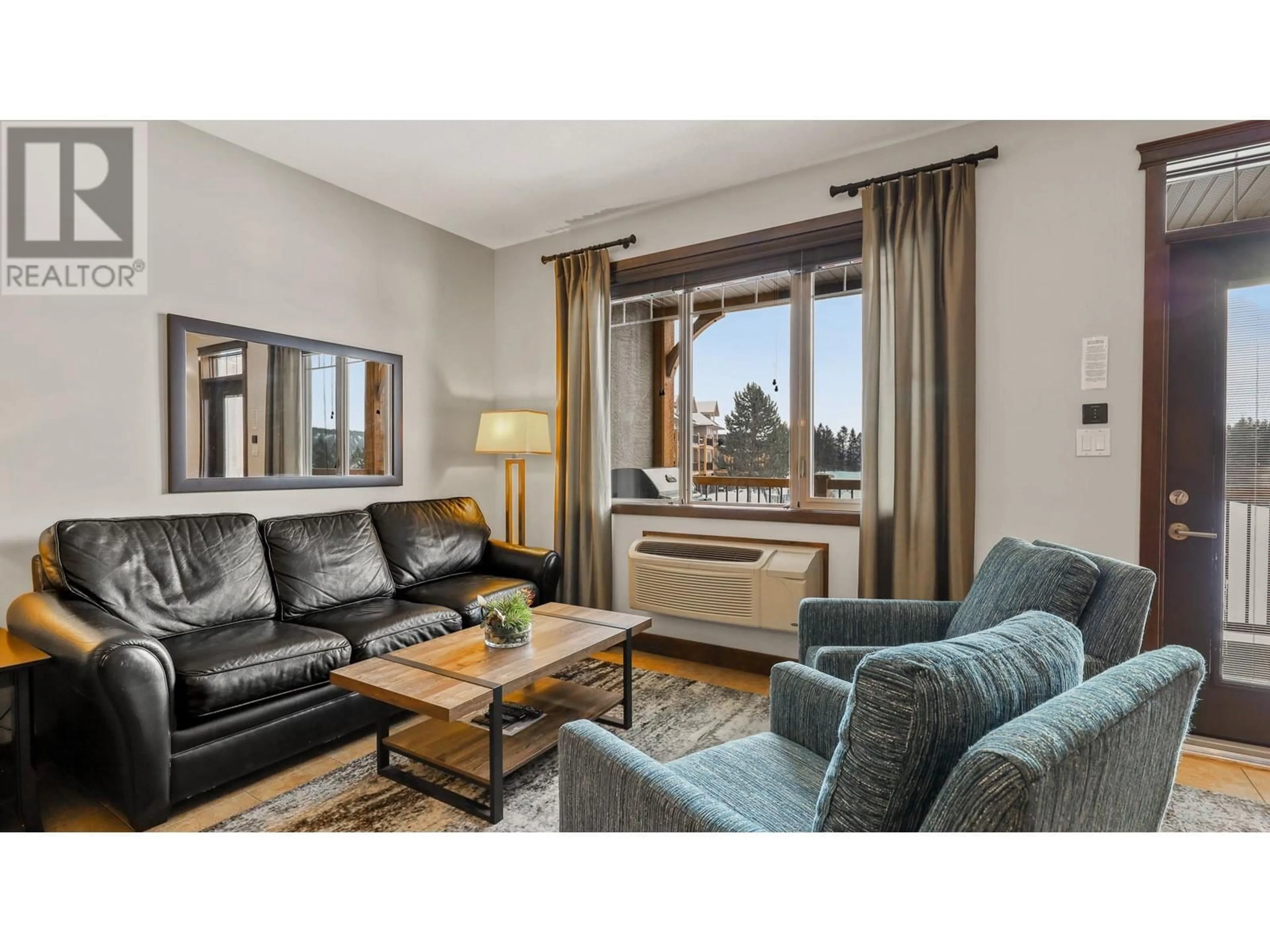 Living room with furniture, wood/laminate floor for 800 BIGHORN Boulevard Unit# 822B, Radium Hot Springs British Columbia V0A1M0