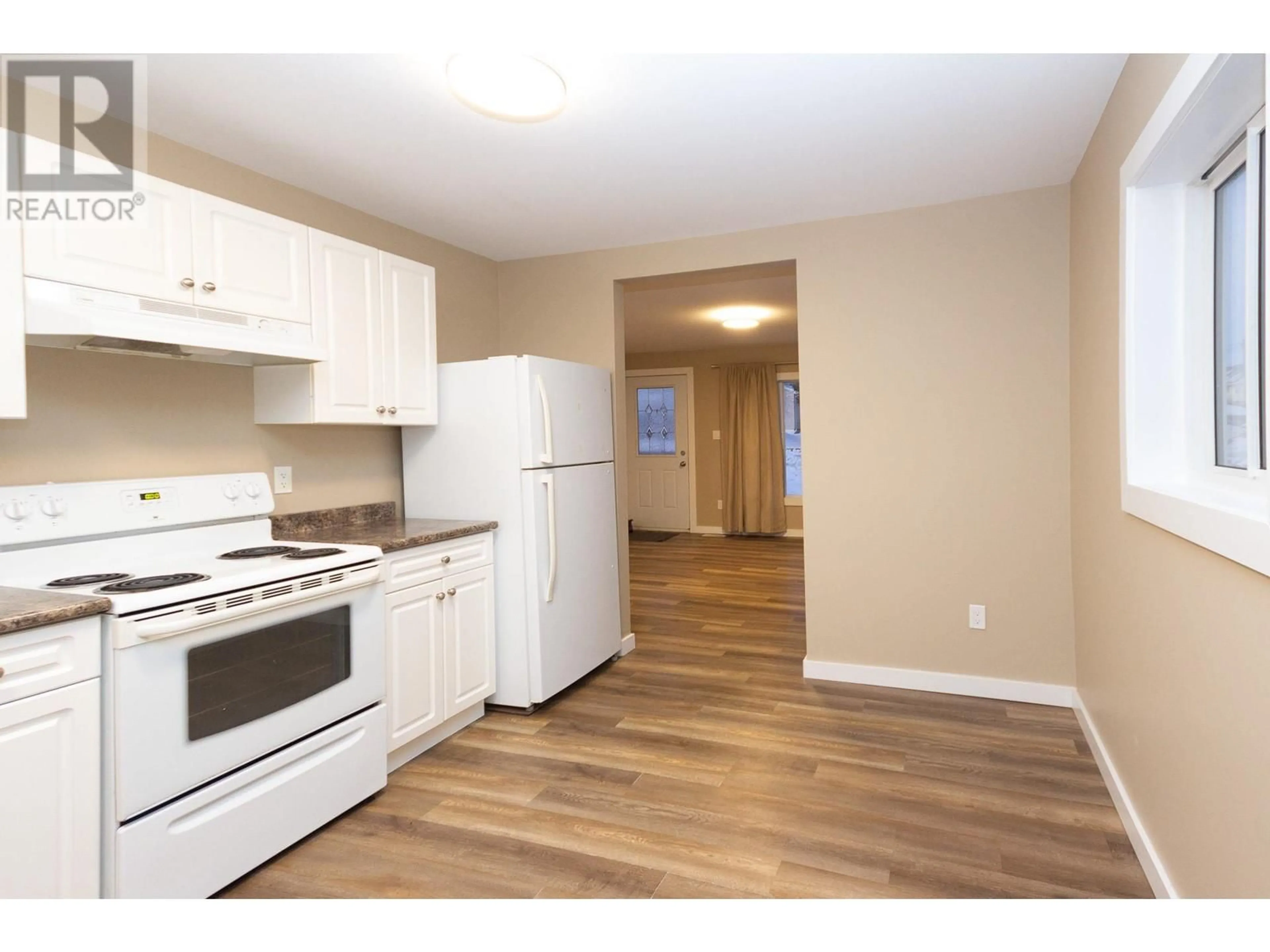 Standard kitchen, wood/laminate floor for 301 100A Avenue, Dawson Creek British Columbia V1G1X5