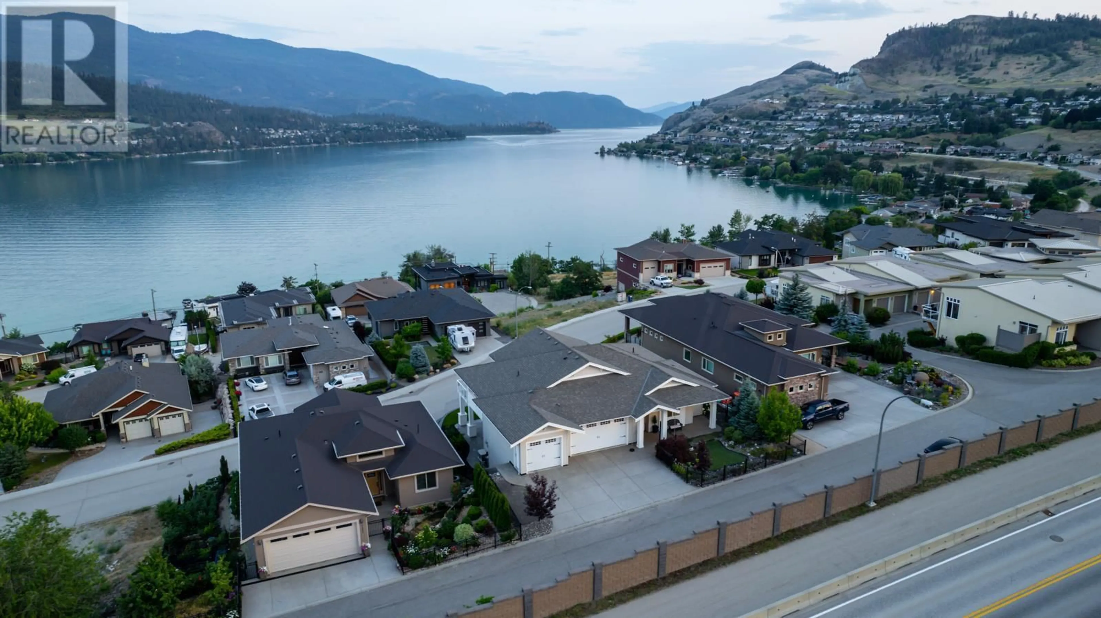 A pic from outside/outdoor area/front of a property/back of a property/a pic from drone, water/lake/river/ocean view for 7345 Pointe Sage Drive, Coldstream British Columbia V1B4A5