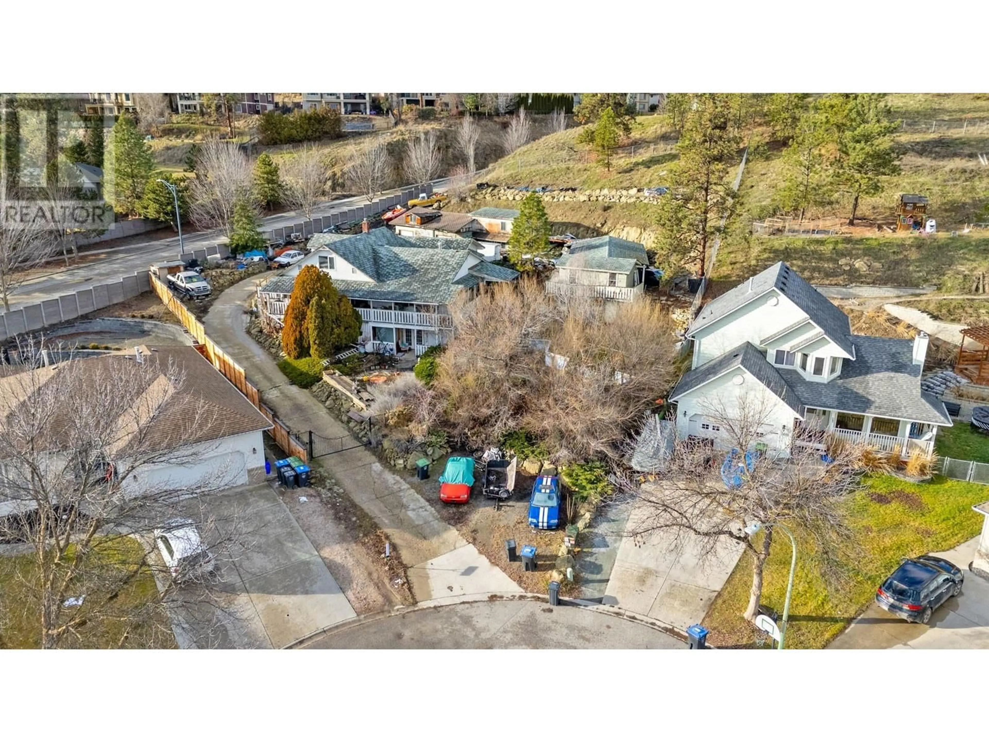 A pic from outside/outdoor area/front of a property/back of a property/a pic from drone, street for 1819 MILLARD COURT, Kelowna British Columbia V1V1W1