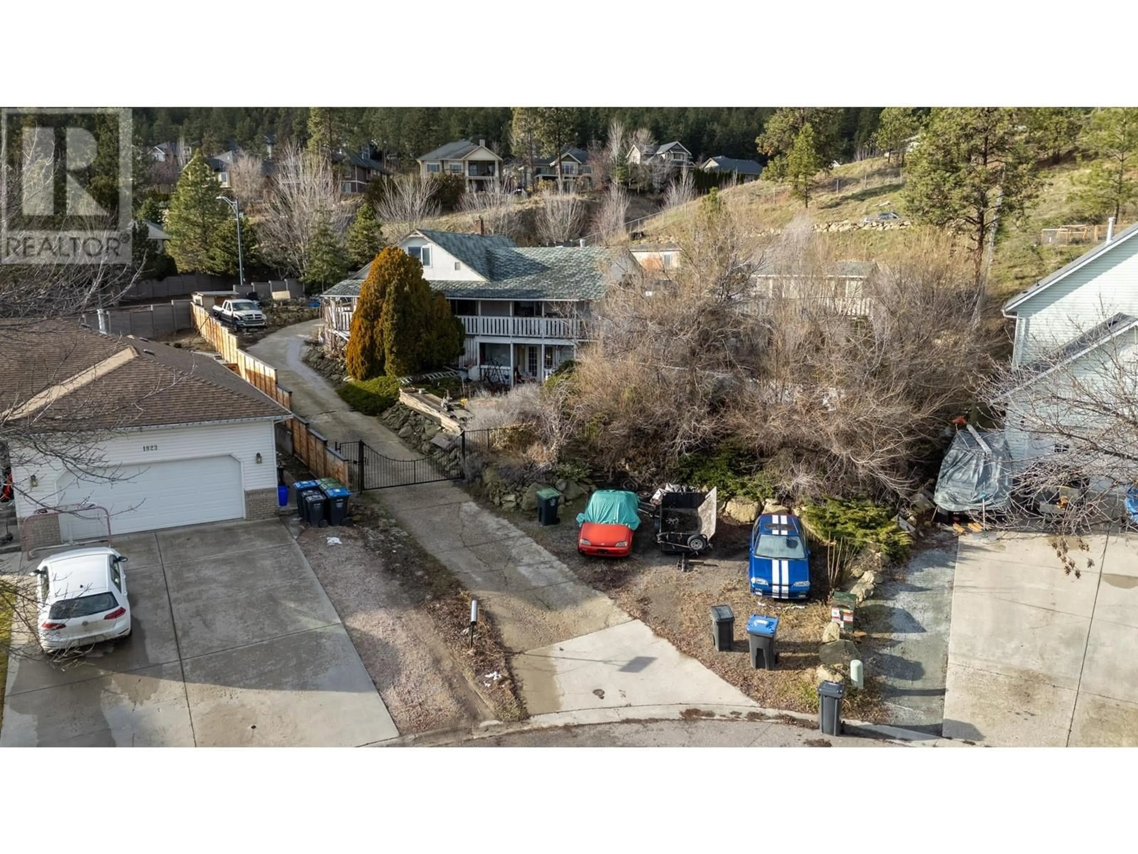 A pic from outside/outdoor area/front of a property/back of a property/a pic from drone, street for 1819 MILLARD COURT, Kelowna British Columbia V1V1W1