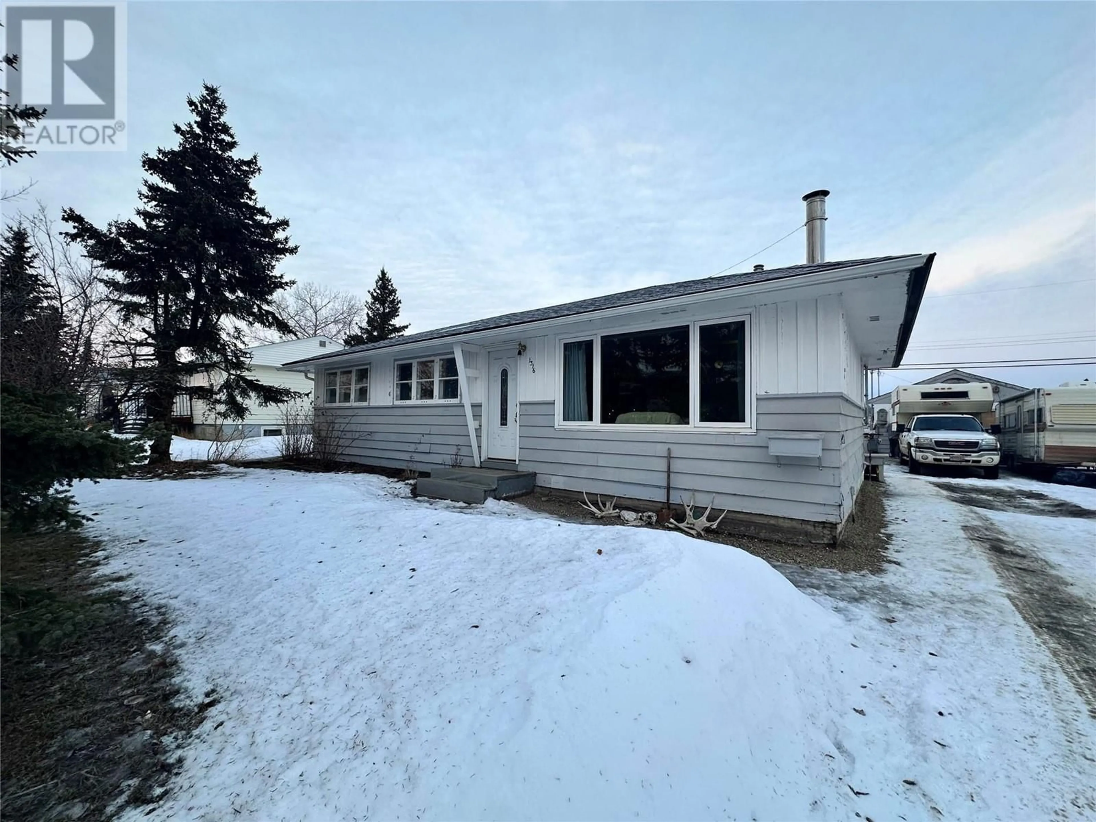 A pic from outside/outdoor area/front of a property/back of a property/a pic from drone, street for 1316 116 Avenue, Dawson Creek British Columbia V1G3E7