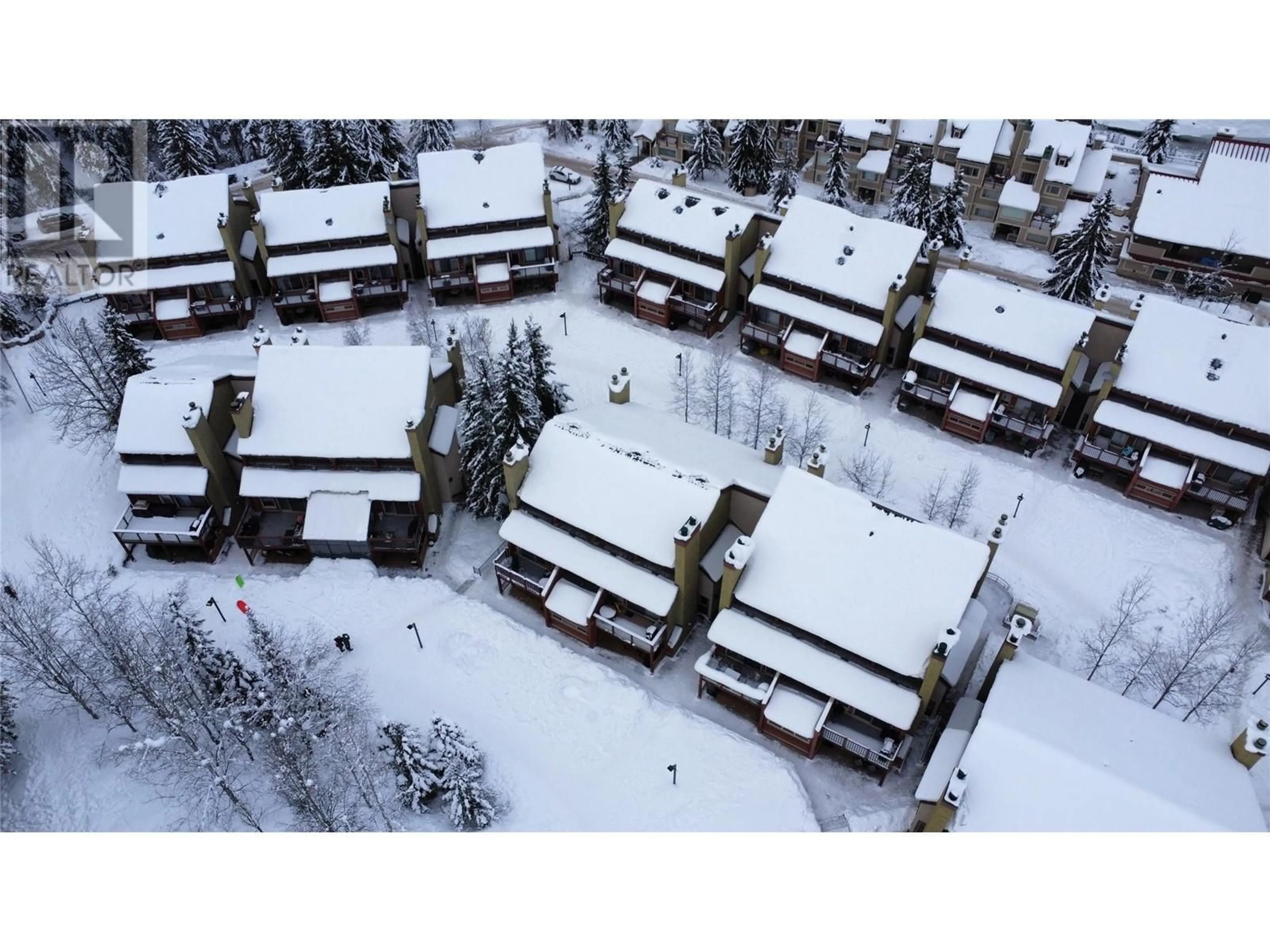 A pic from outside/outdoor area/front of a property/back of a property/a pic from drone, unknown for 2030 Panorama Drive Unit# 1021, Panorama British Columbia V0A1T1