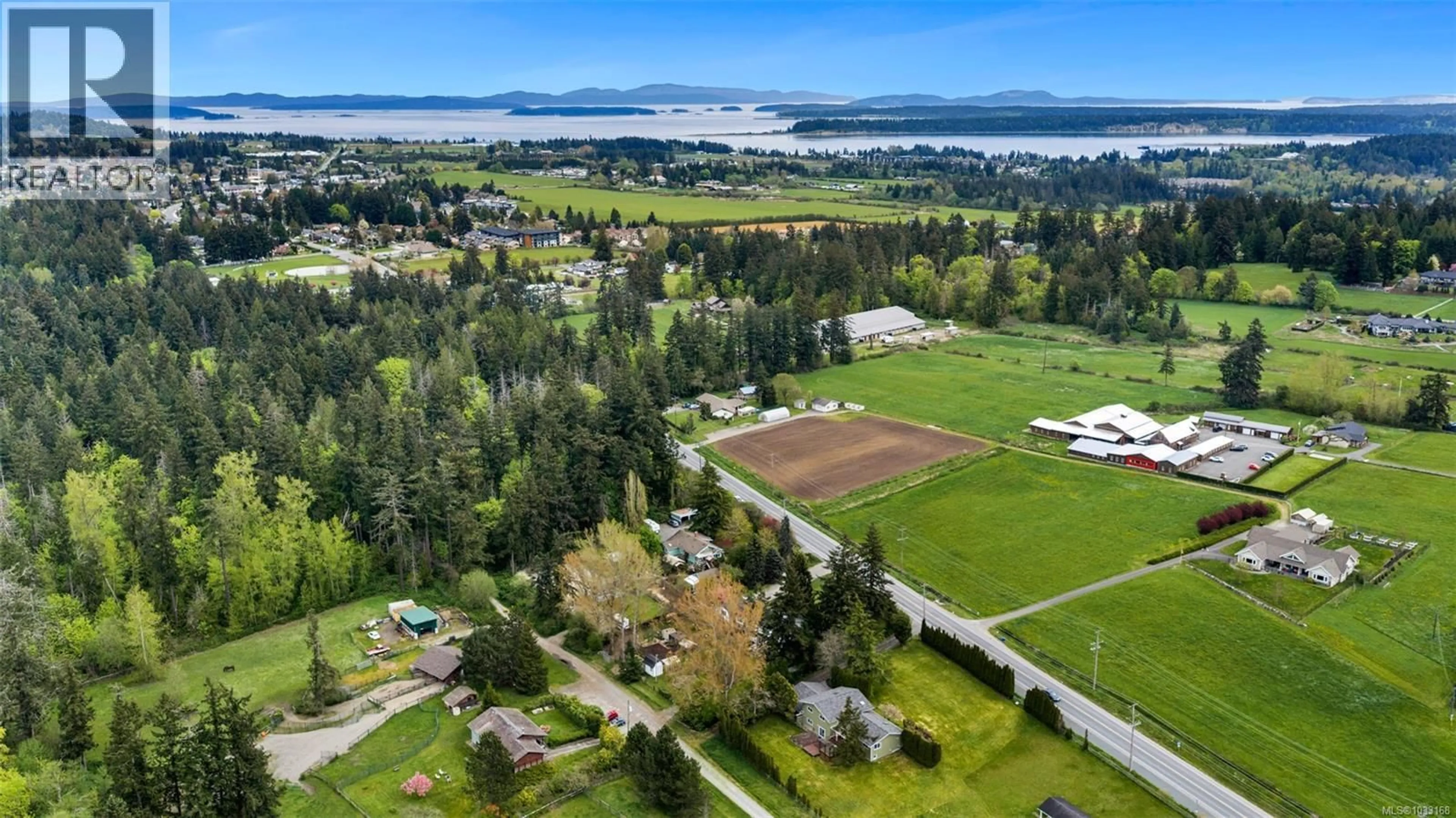 A pic from outside/outdoor area/front of a property/back of a property/a pic from drone, mountain view for 7356 WALLACE DRIVE, Central Saanich British Columbia V8M1S9