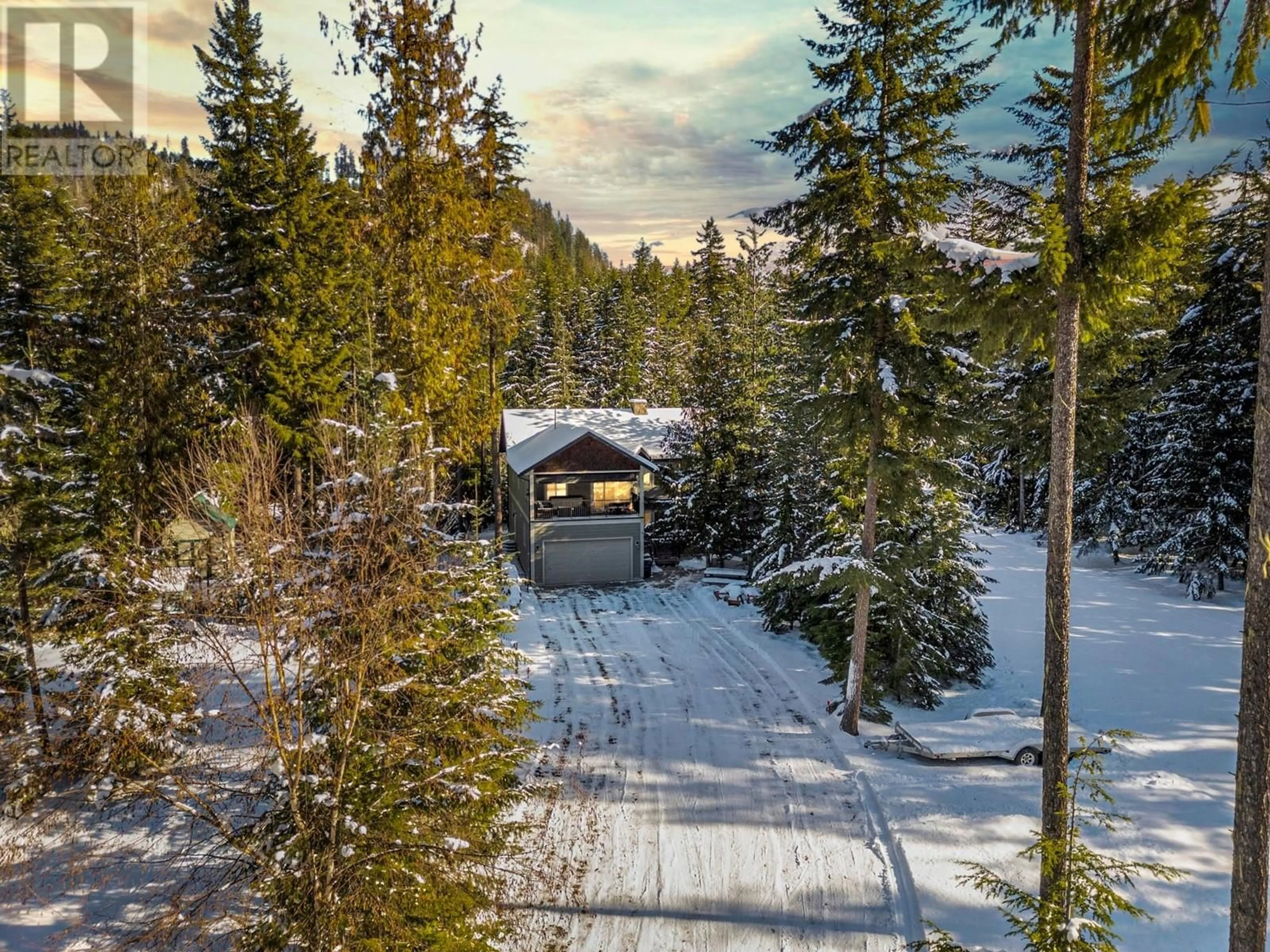 A pic from outside/outdoor area/front of a property/back of a property/a pic from drone, forest/trees view for 58 - 30 LUSK LAKE ROAD, Enderby British Columbia V0E1V5