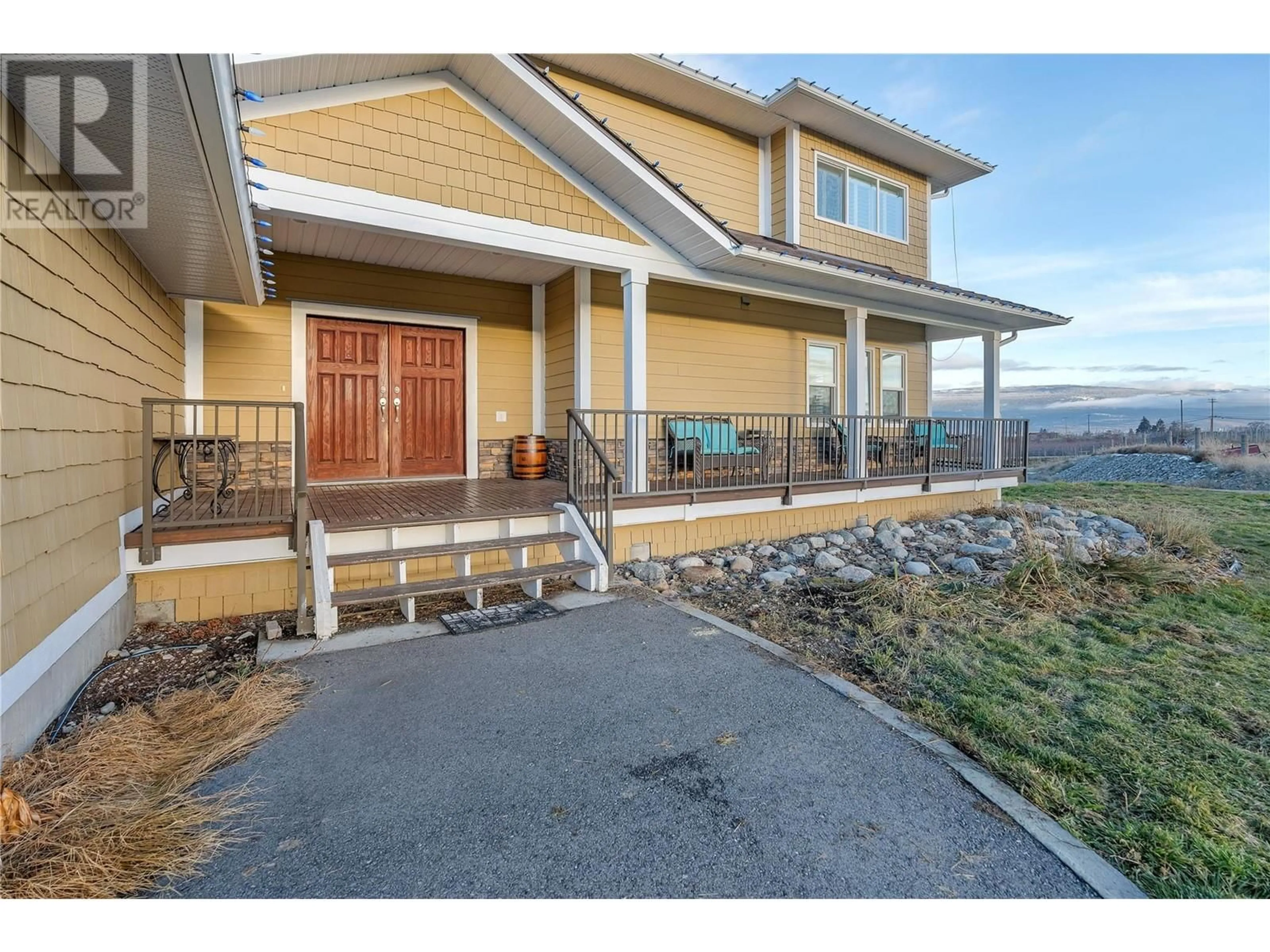 Home with vinyl exterior material, mountain view for 16600 Bentley Road, Summerland British Columbia V0H1Z3