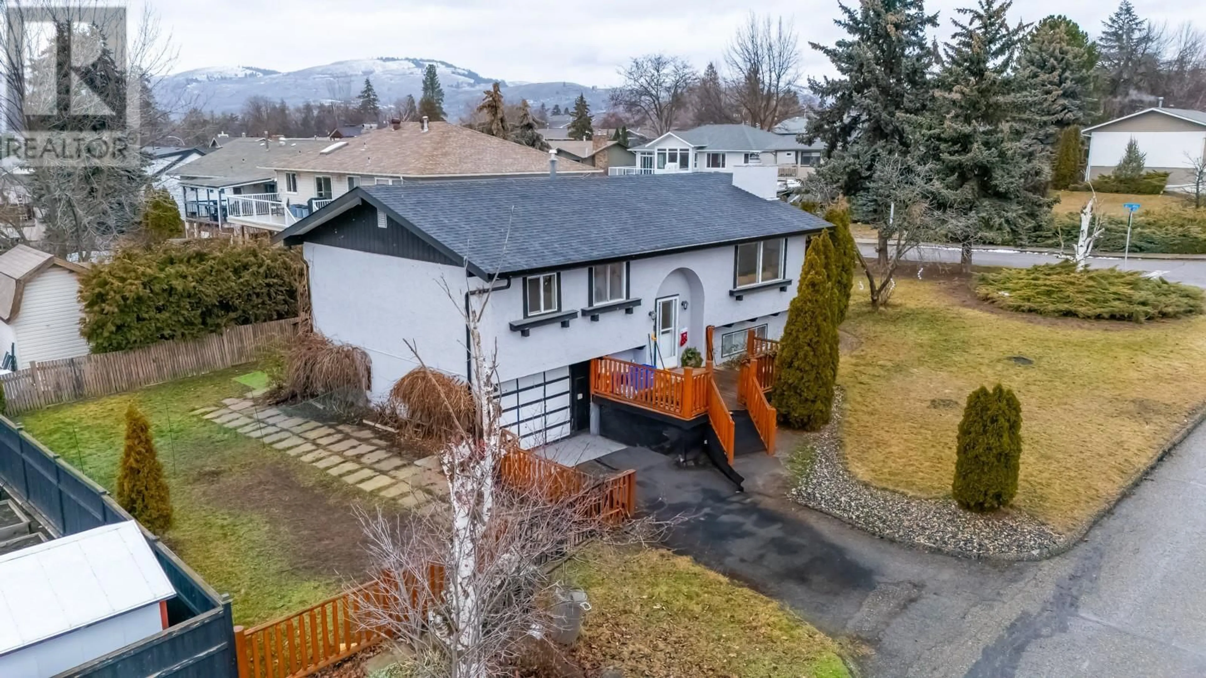 A pic from outside/outdoor area/front of a property/back of a property/a pic from drone, mountain view for 2002 21 Street, Vernon British Columbia V1T7C2