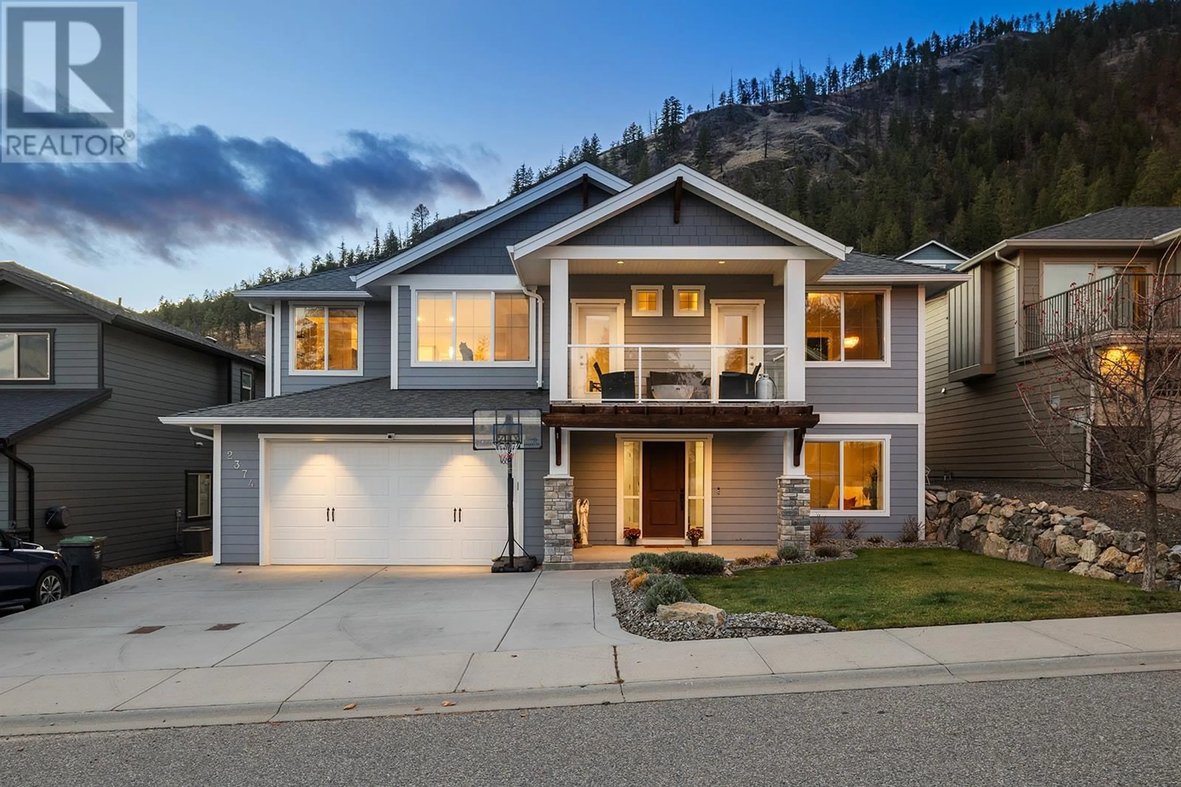 Home with vinyl exterior material, mountain view for 2374 Tallus Green Crescent, West Kelowna British Columbia V4T3K4