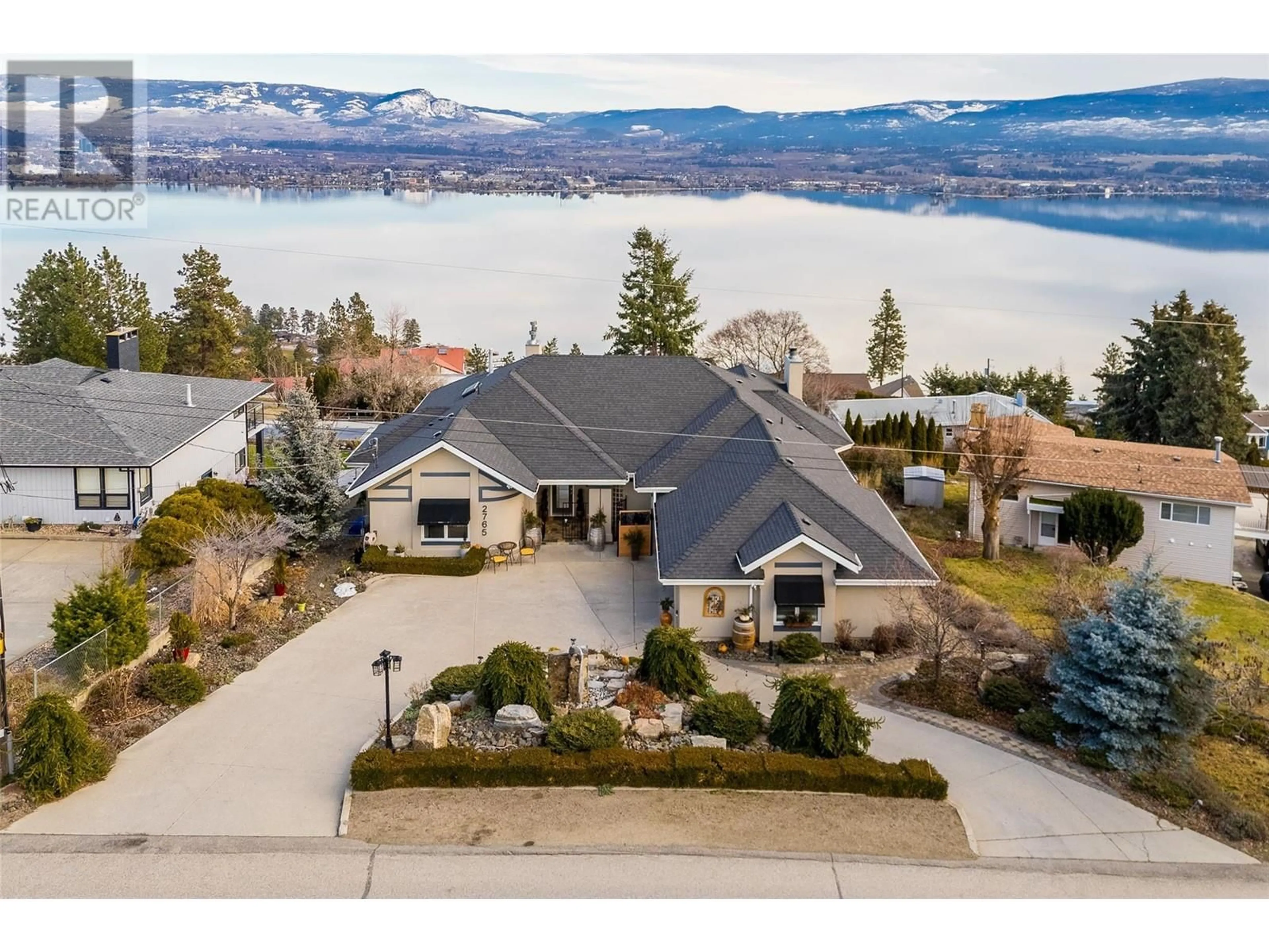 A pic from outside/outdoor area/front of a property/back of a property/a pic from drone, water/lake/river/ocean view for 2765 Thacker Drive, West Kelowna British Columbia V1Z1W5