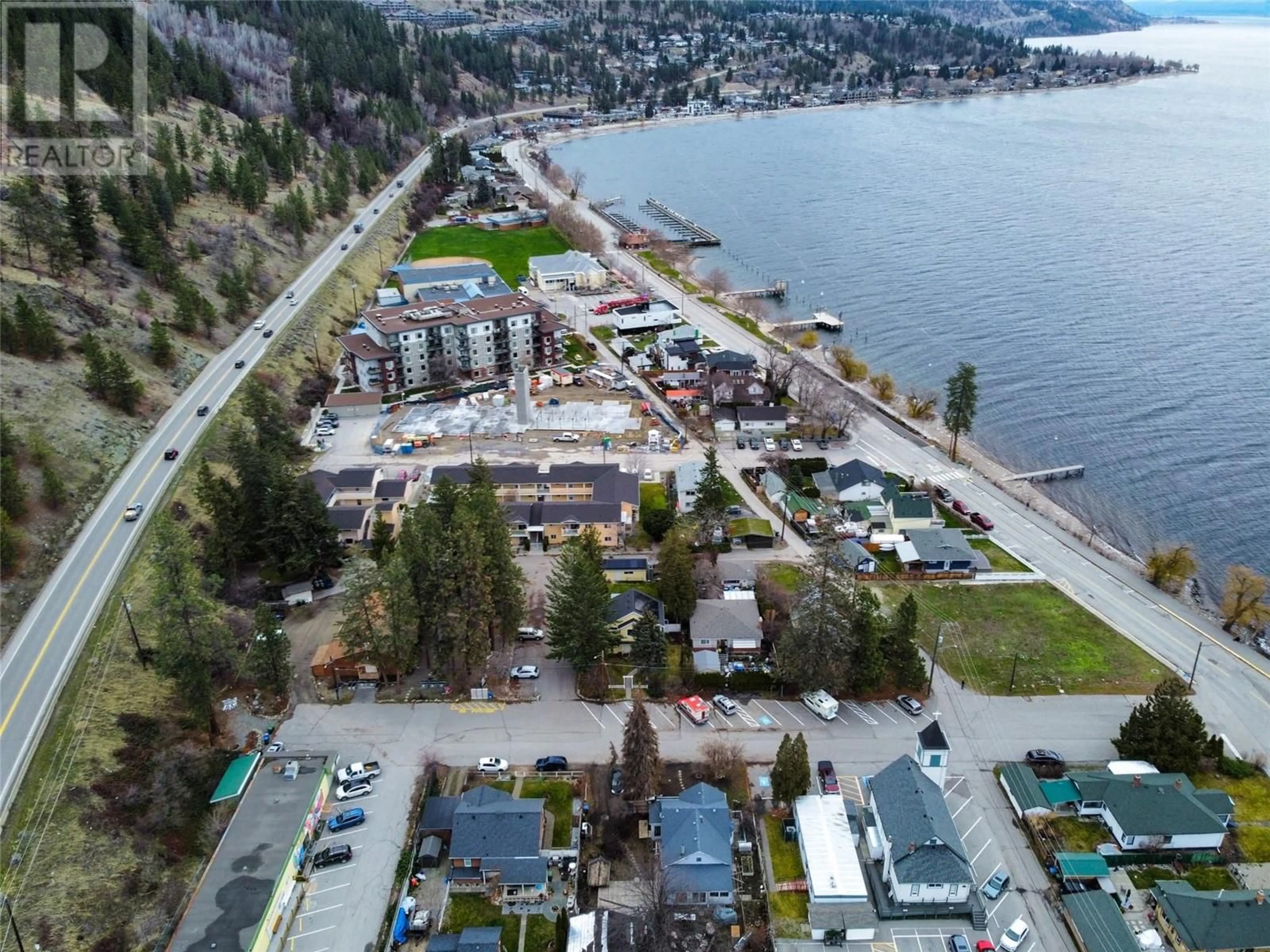 A pic from outside/outdoor area/front of a property/back of a property/a pic from drone, water/lake/river/ocean view for 4416 4th Street, Peachland British Columbia V0H1X6