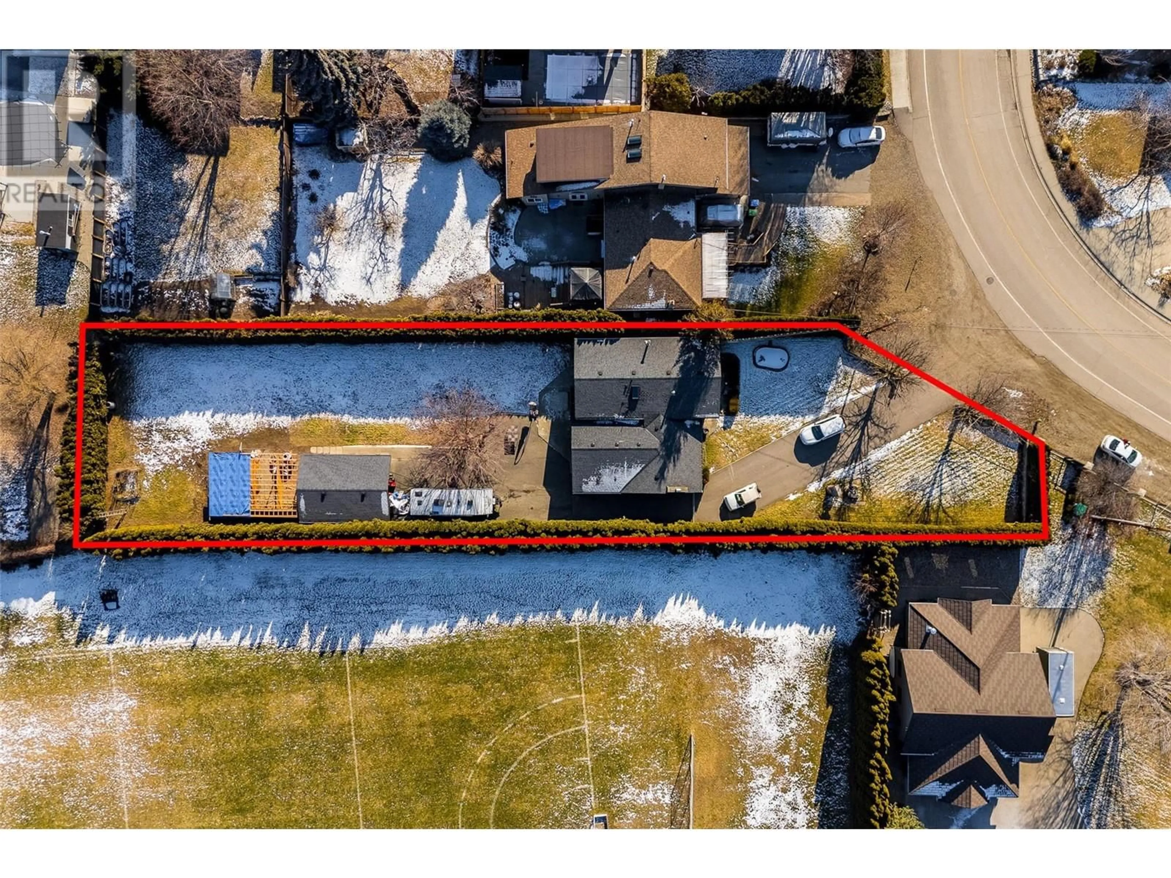 A pic from outside/outdoor area/front of a property/back of a property/a pic from drone, street for 4553 McClure Road, Kelowna British Columbia V1W1L4