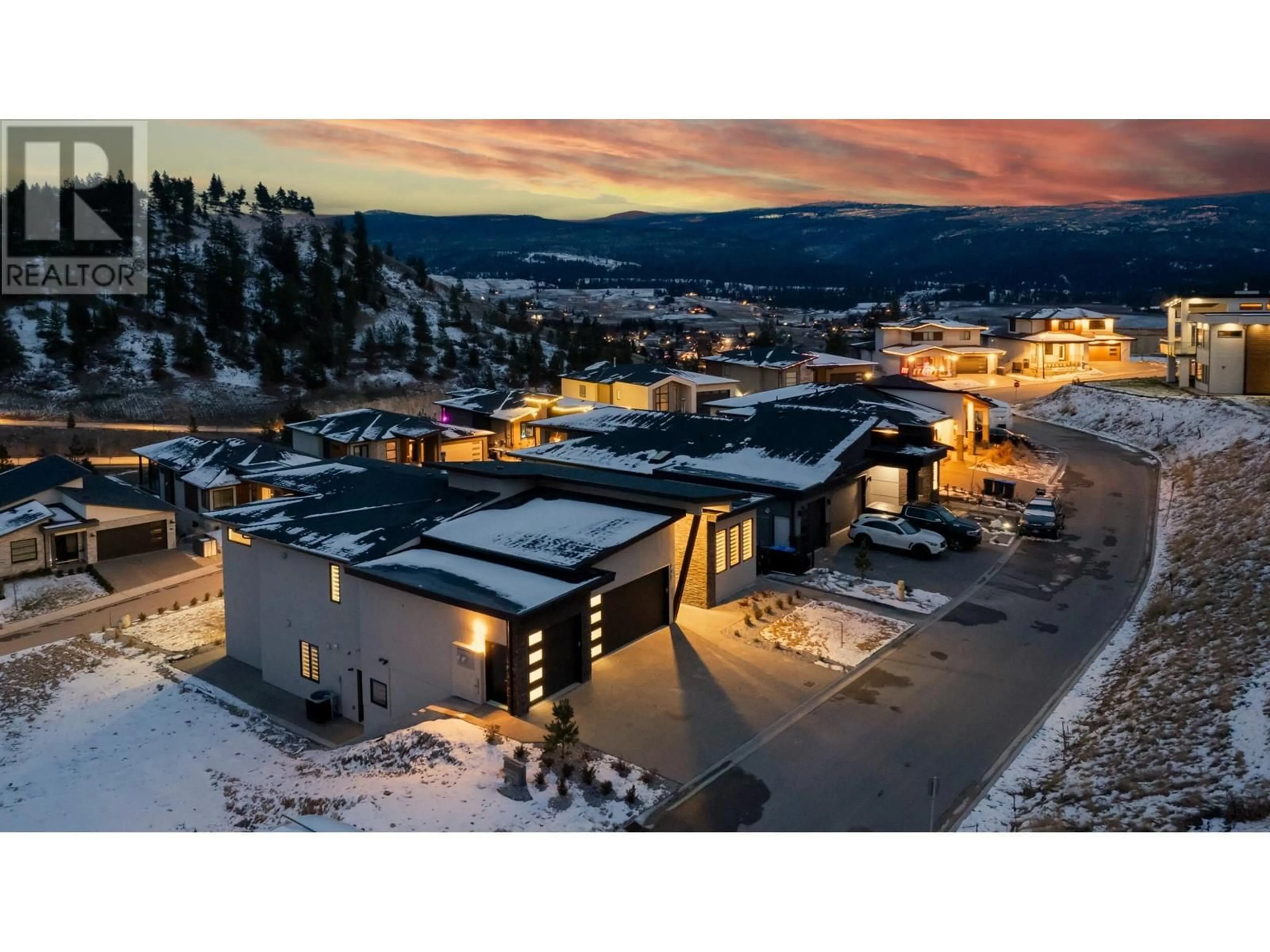 A pic from outside/outdoor area/front of a property/back of a property/a pic from drone, mountain view for 937 Royal Troon Lane, Kelowna British Columbia V1P0A3