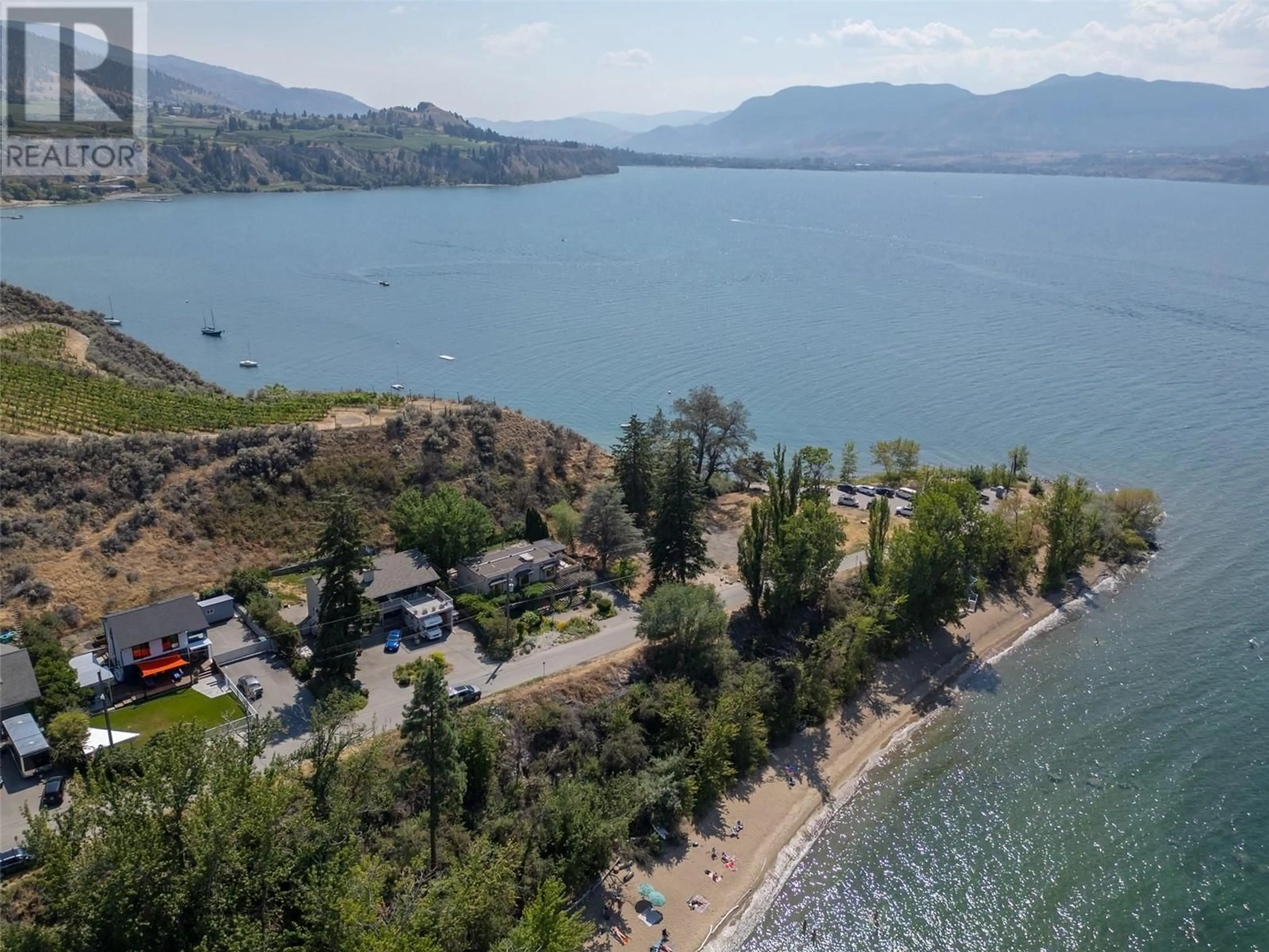 A pic from outside/outdoor area/front of a property/back of a property/a pic from drone, water/lake/river/ocean view for 830 Three Mile Road, Penticton British Columbia V2A8T7