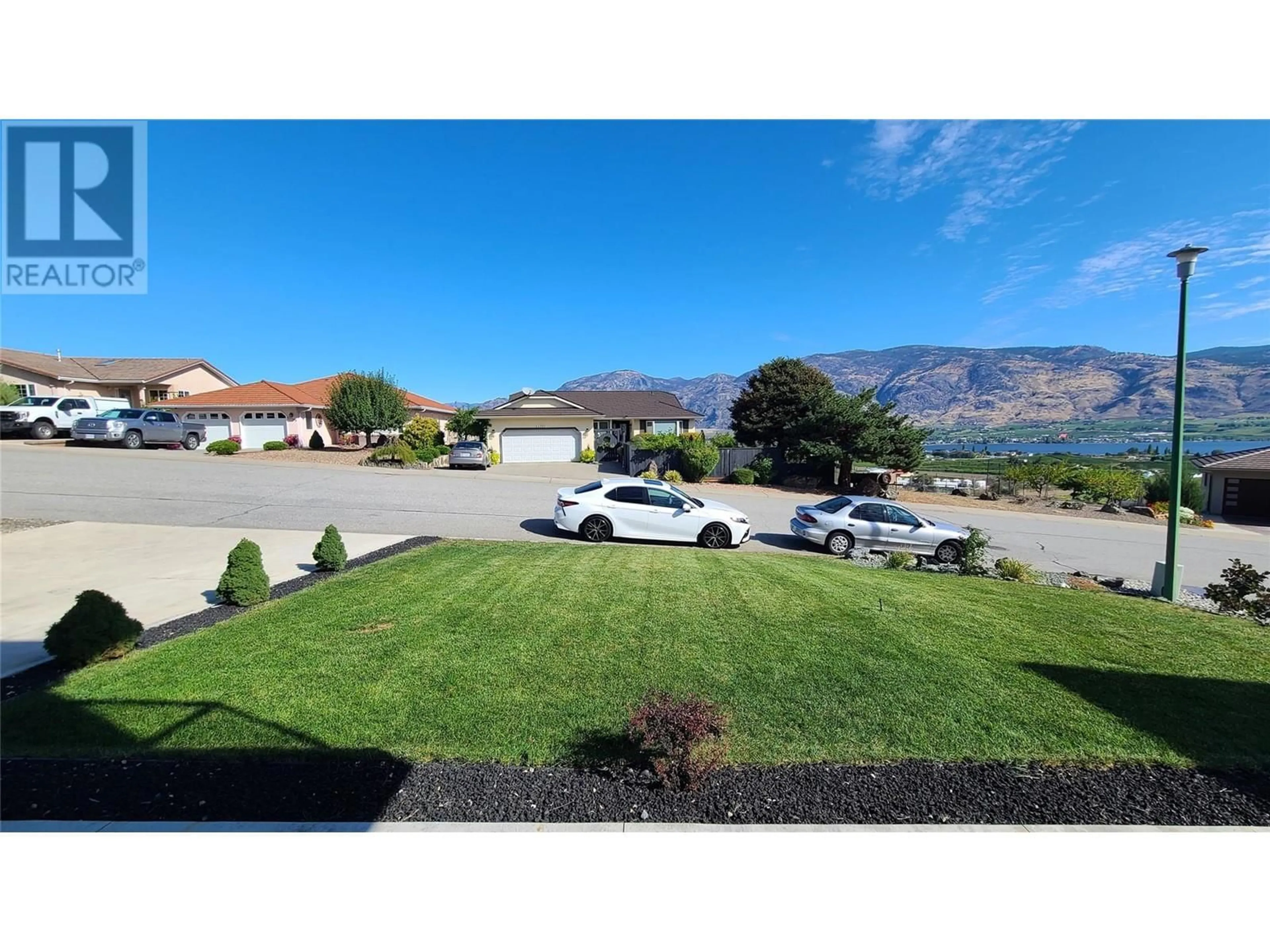 A pic from outside/outdoor area/front of a property/back of a property/a pic from drone, mountain view for 11700 LA COSTA Lane, Osoyoos British Columbia V0H1V1