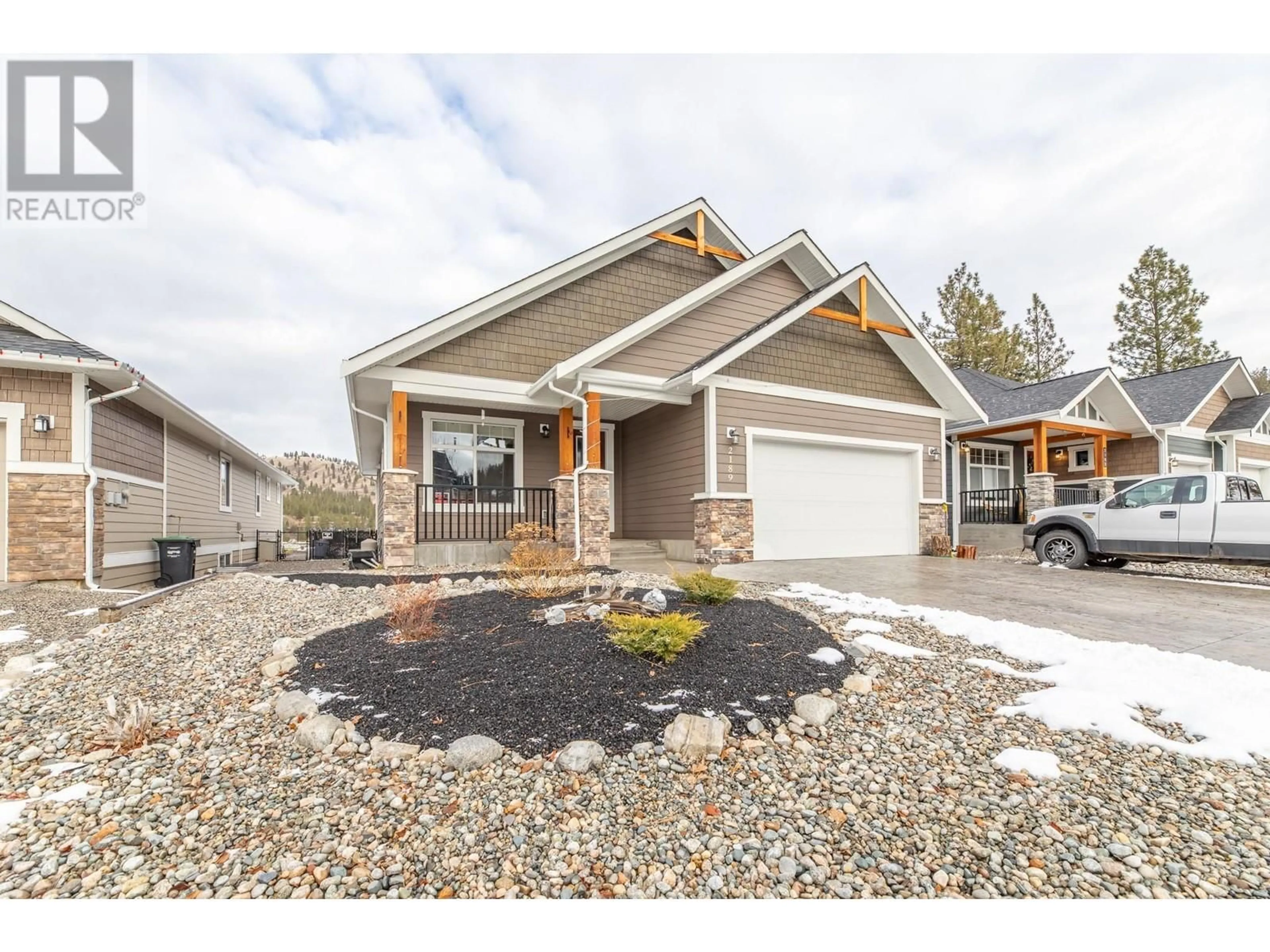 Home with vinyl exterior material, street for 2189 BRENT Drive, Penticton British Columbia V2A8M9