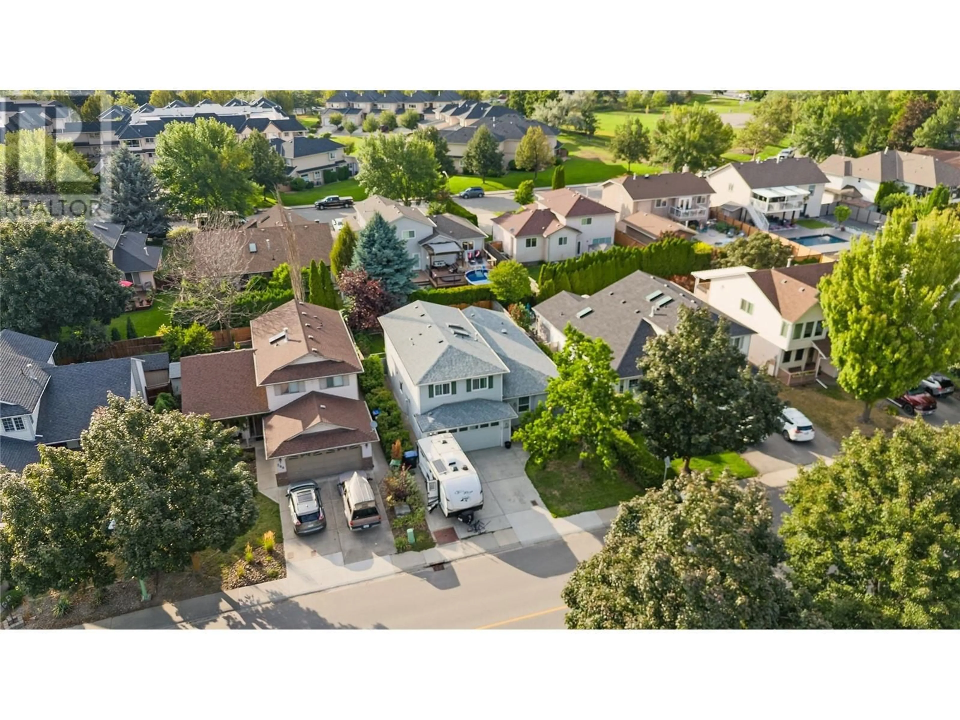 A pic from outside/outdoor area/front of a property/back of a property/a pic from drone, street for 284 Drysdale Boulevard, Kelowna British Columbia V1V1P5