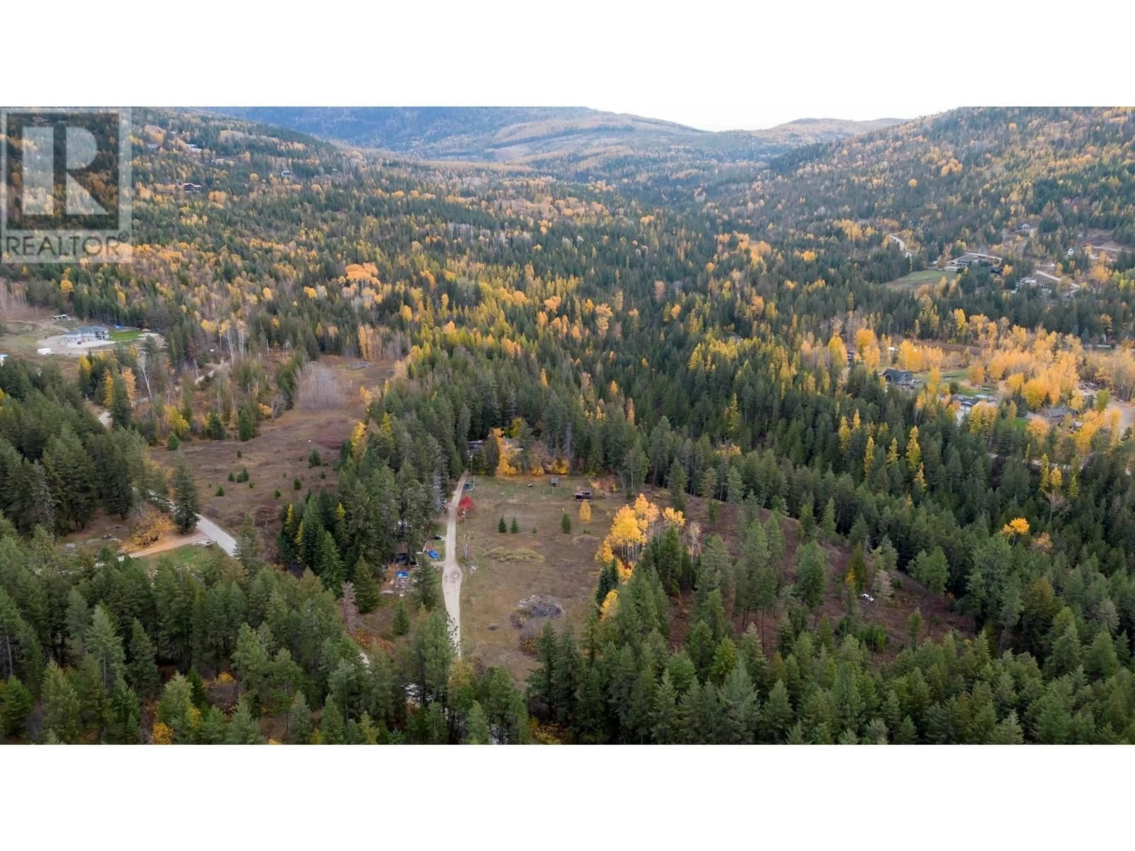 A pic from outside/outdoor area/front of a property/back of a property/a pic from drone, forest/trees view for WALLACE ROAD, Vernon British Columbia V1B3N2