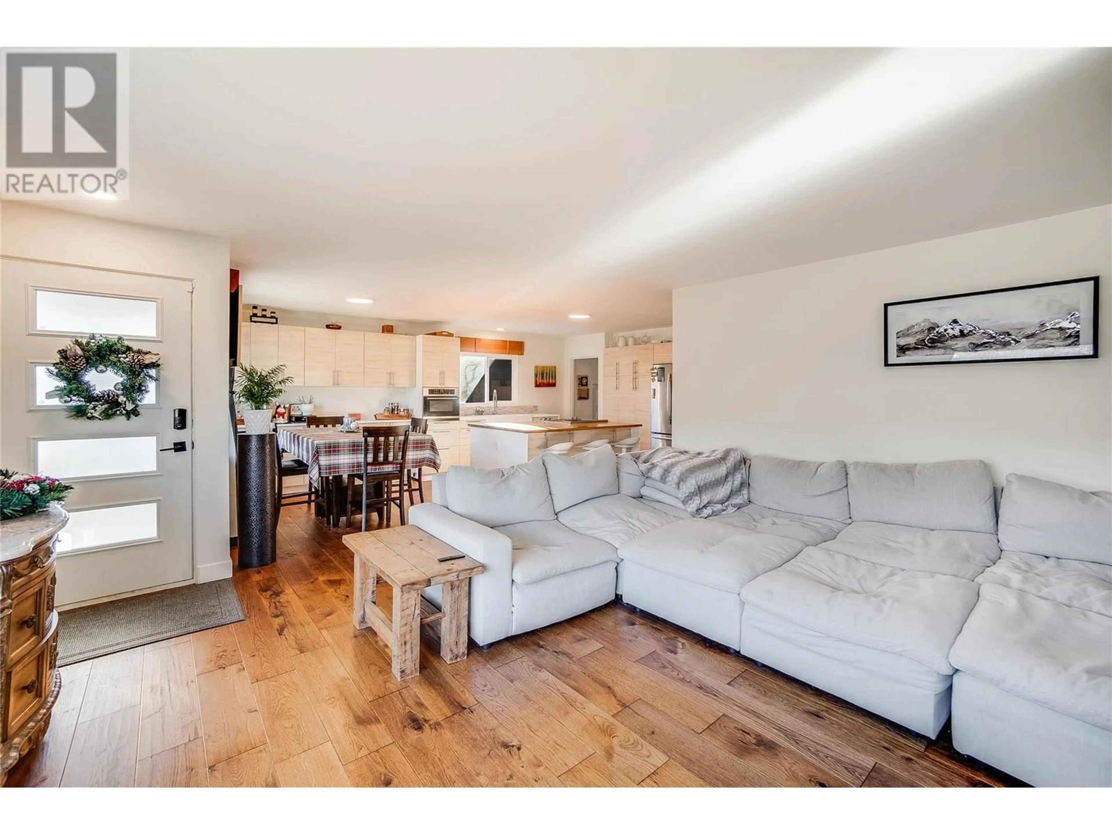 Living room with furniture, wood/laminate floor for 3408 8th Avenue, Castlegar British Columbia V1N2Y4