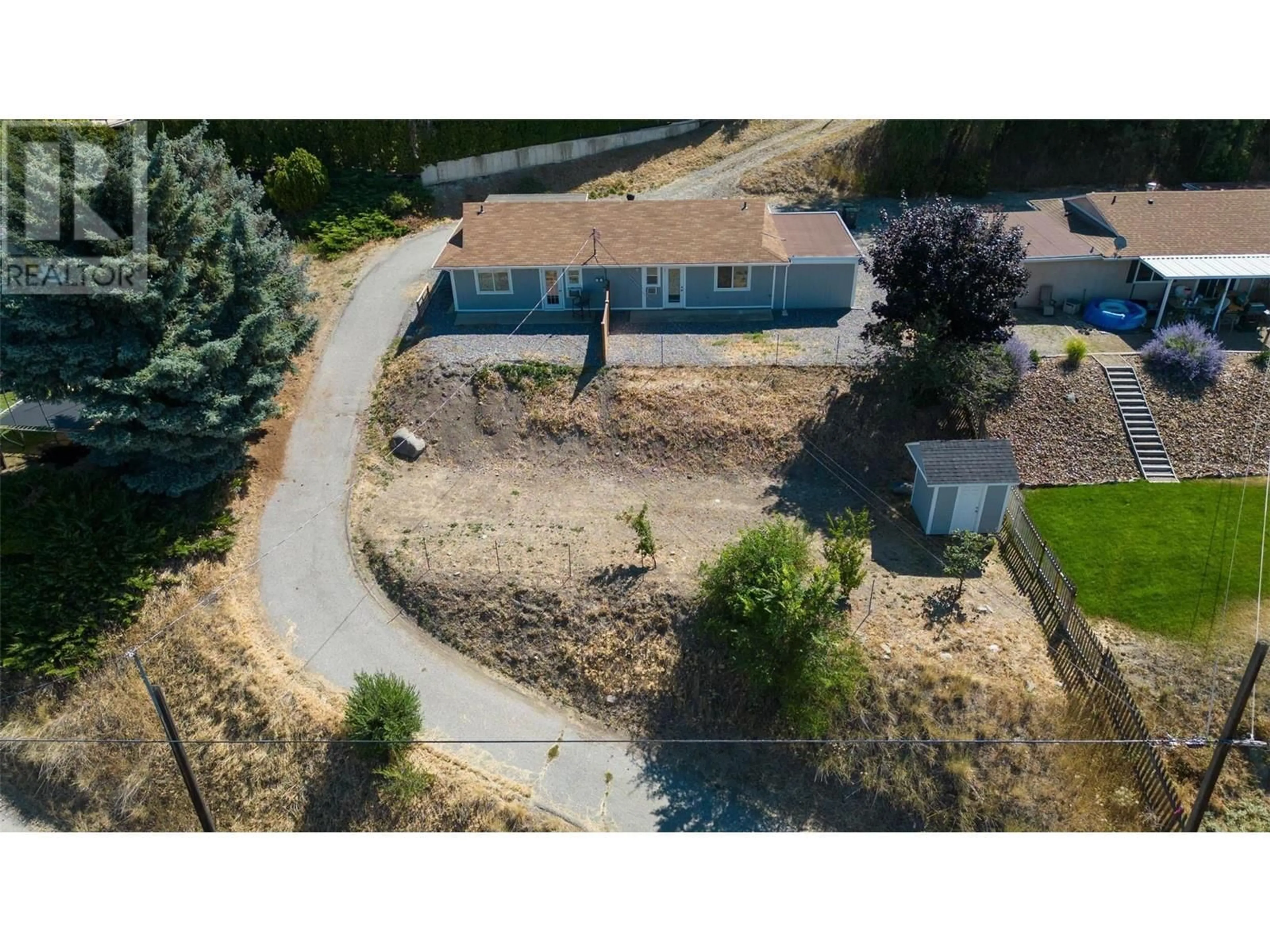 A pic from outside/outdoor area/front of a property/back of a property/a pic from drone, unknown for 11287 LODGE ROAD, Lake Country British Columbia V4V1Y2