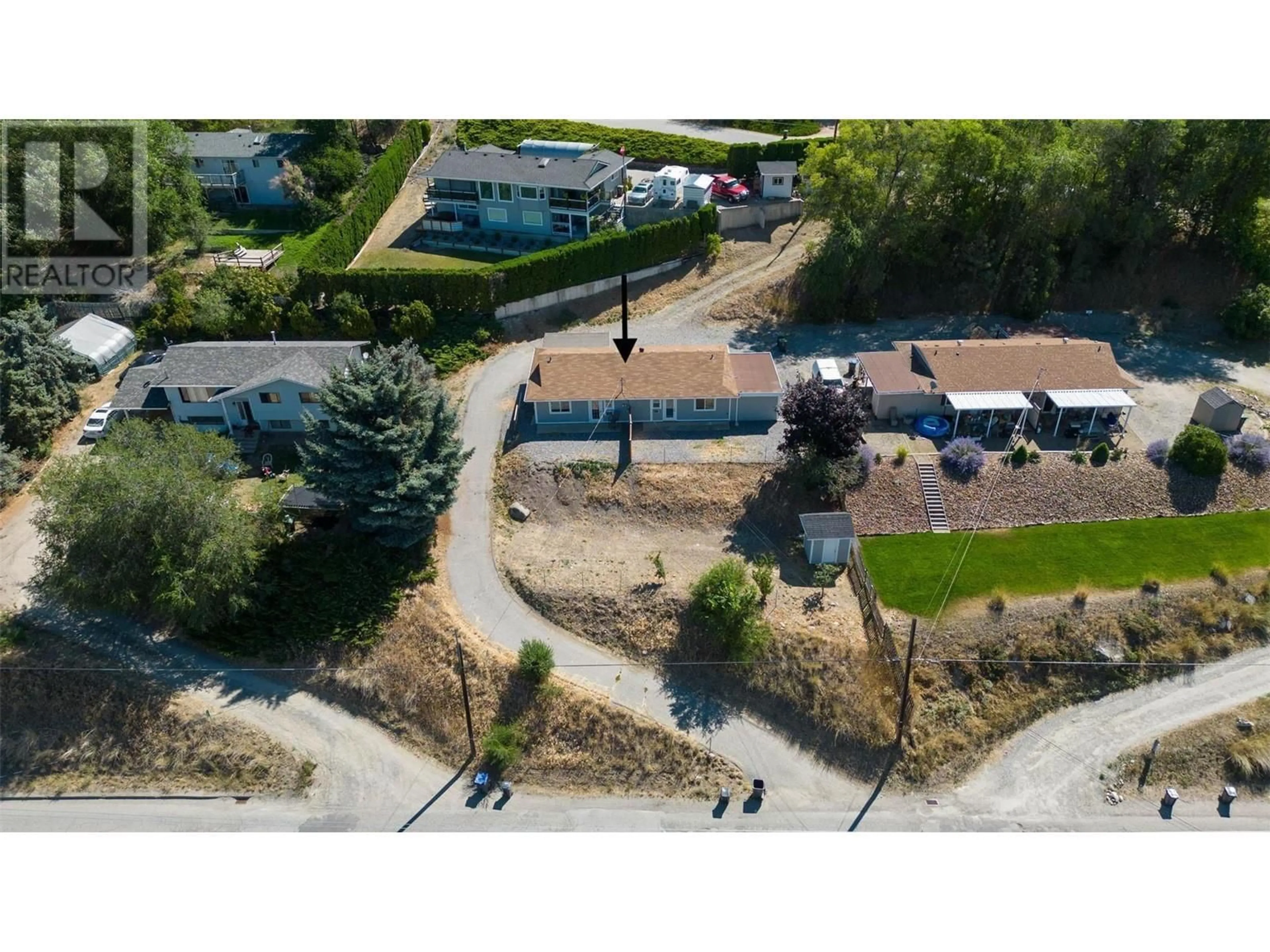 A pic from outside/outdoor area/front of a property/back of a property/a pic from drone, street for 11287 Lodge Road, Lake Country British Columbia V4V1Y2