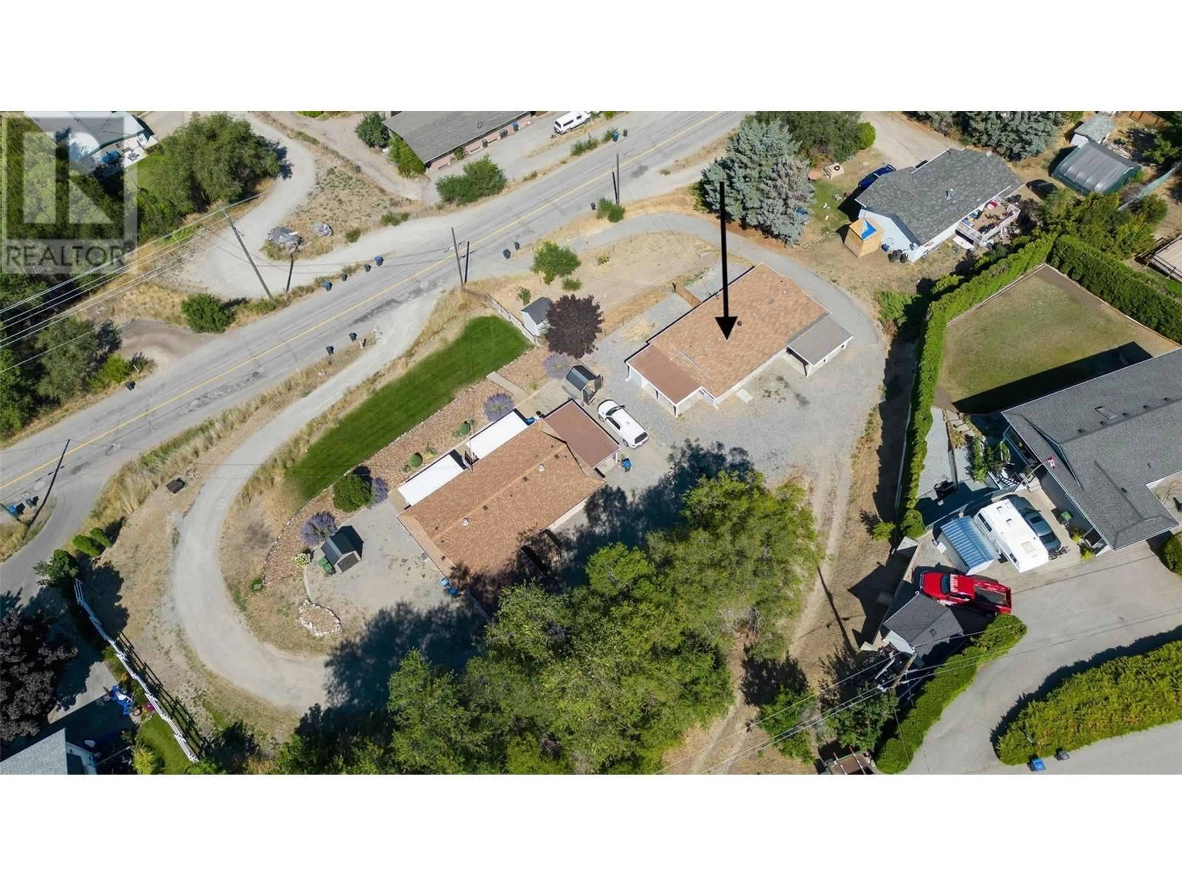 A pic from outside/outdoor area/front of a property/back of a property/a pic from drone, street for 11287 Lodge Road, Lake Country British Columbia V4V1Y2