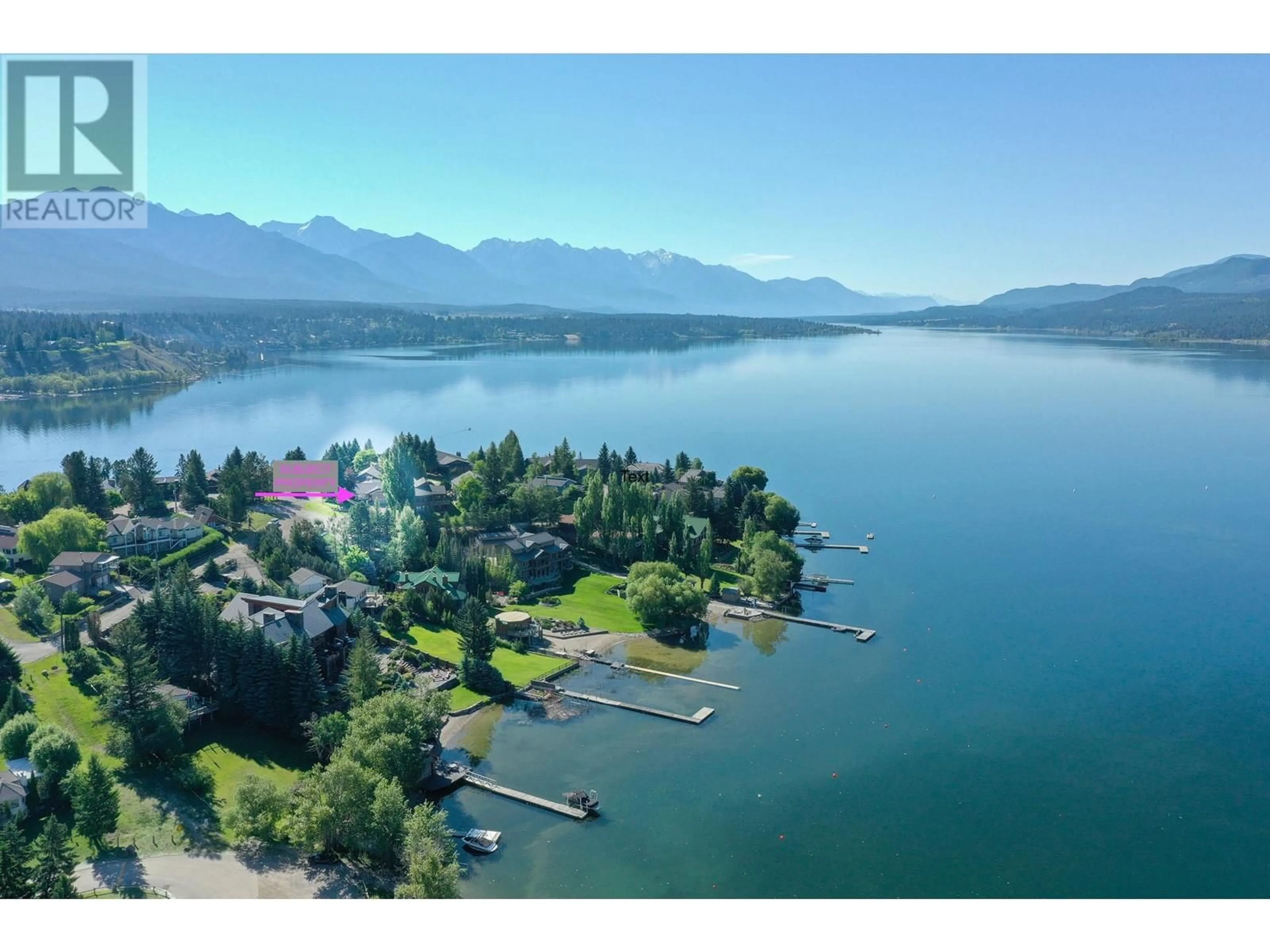 A pic from outside/outdoor area/front of a property/back of a property/a pic from drone, water/lake/river/ocean view for 1745 FORT POINT Close, Invermere British Columbia V0A1K0