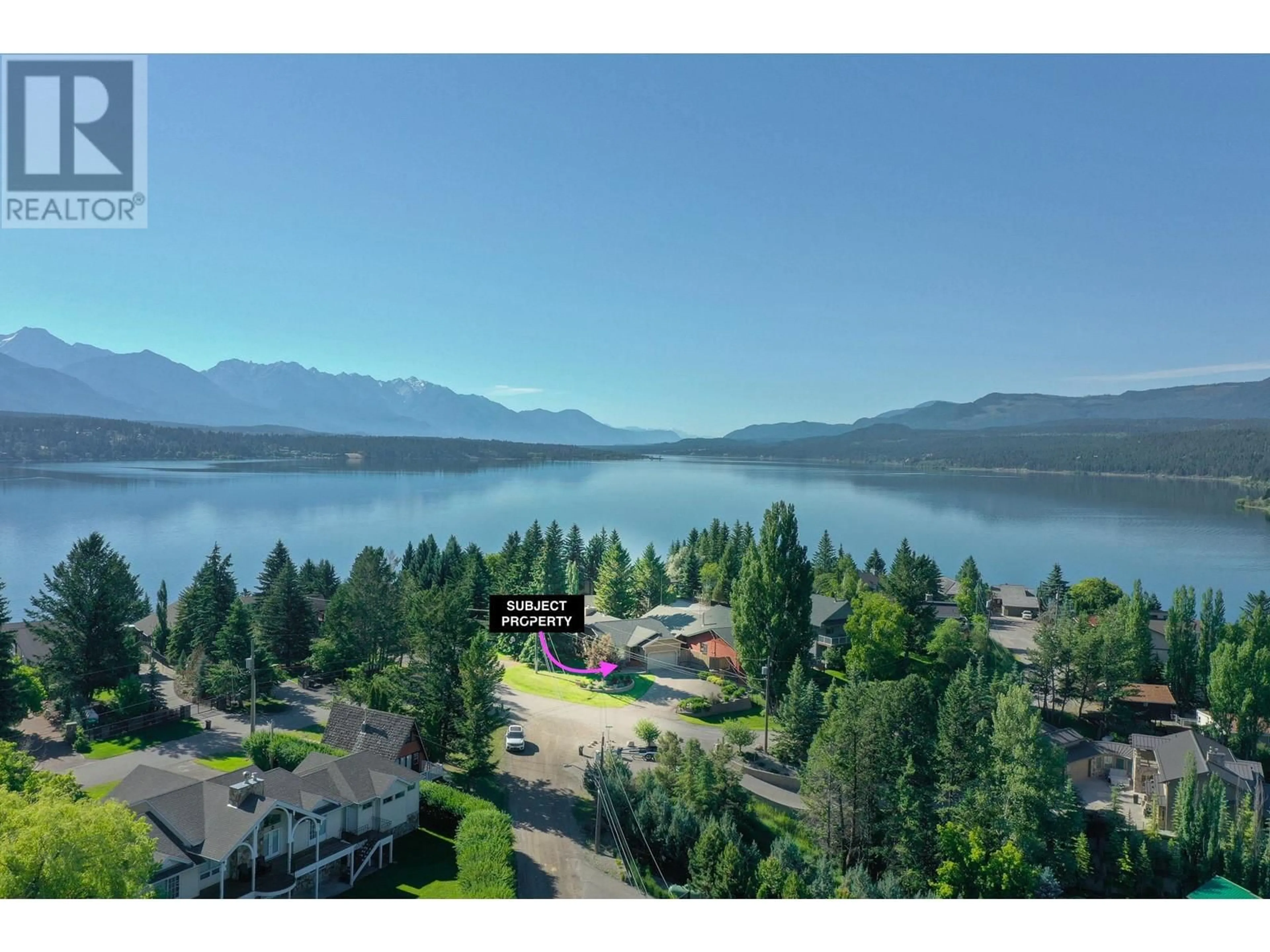 A pic from outside/outdoor area/front of a property/back of a property/a pic from drone, water/lake/river/ocean view for 1745 FORT POINT Close, Invermere British Columbia V0A1K0