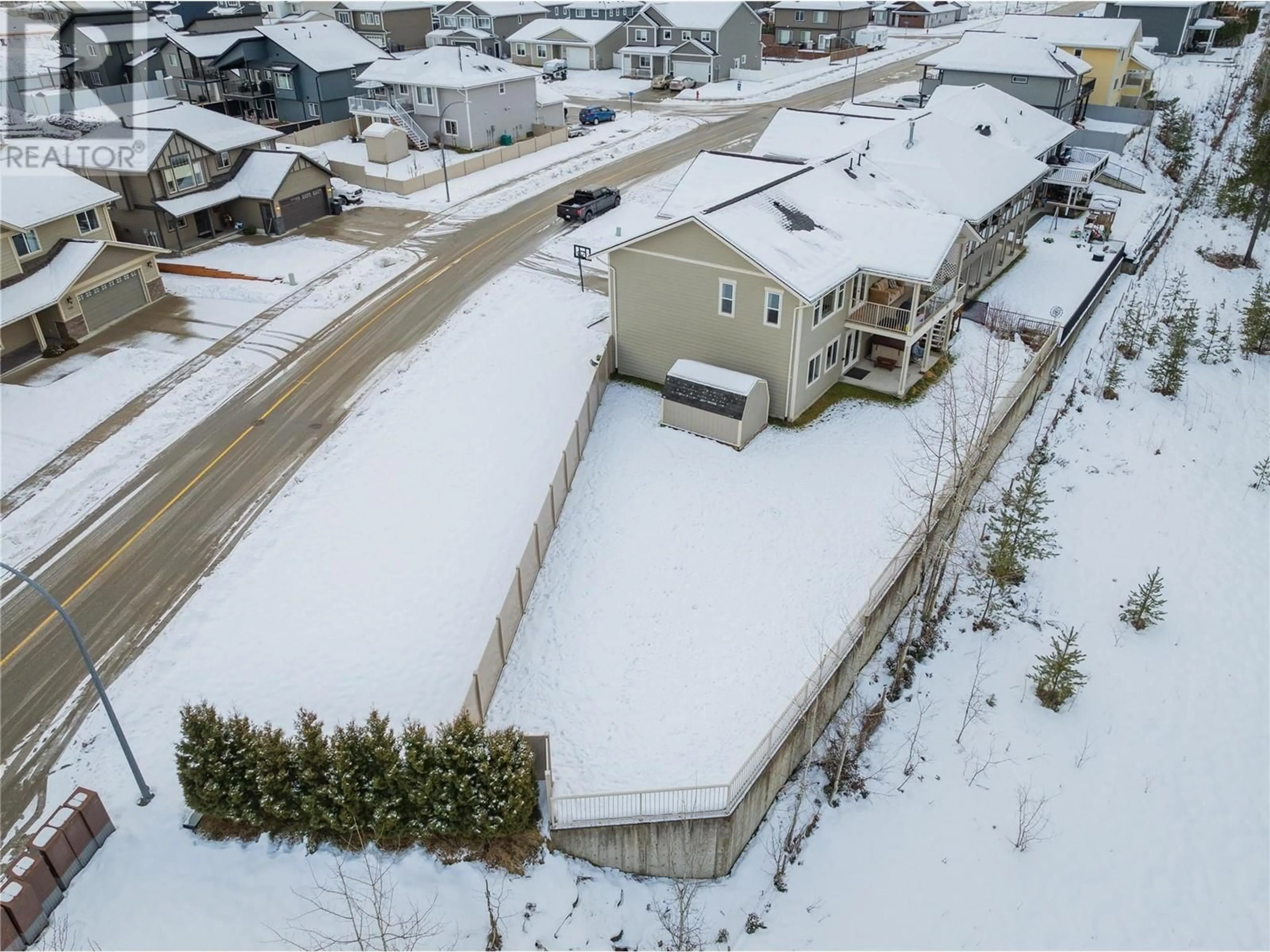 A pic from outside/outdoor area/front of a property/back of a property/a pic from drone, street for 3910 16TH Avenue, Castlegar British Columbia V1N4X8